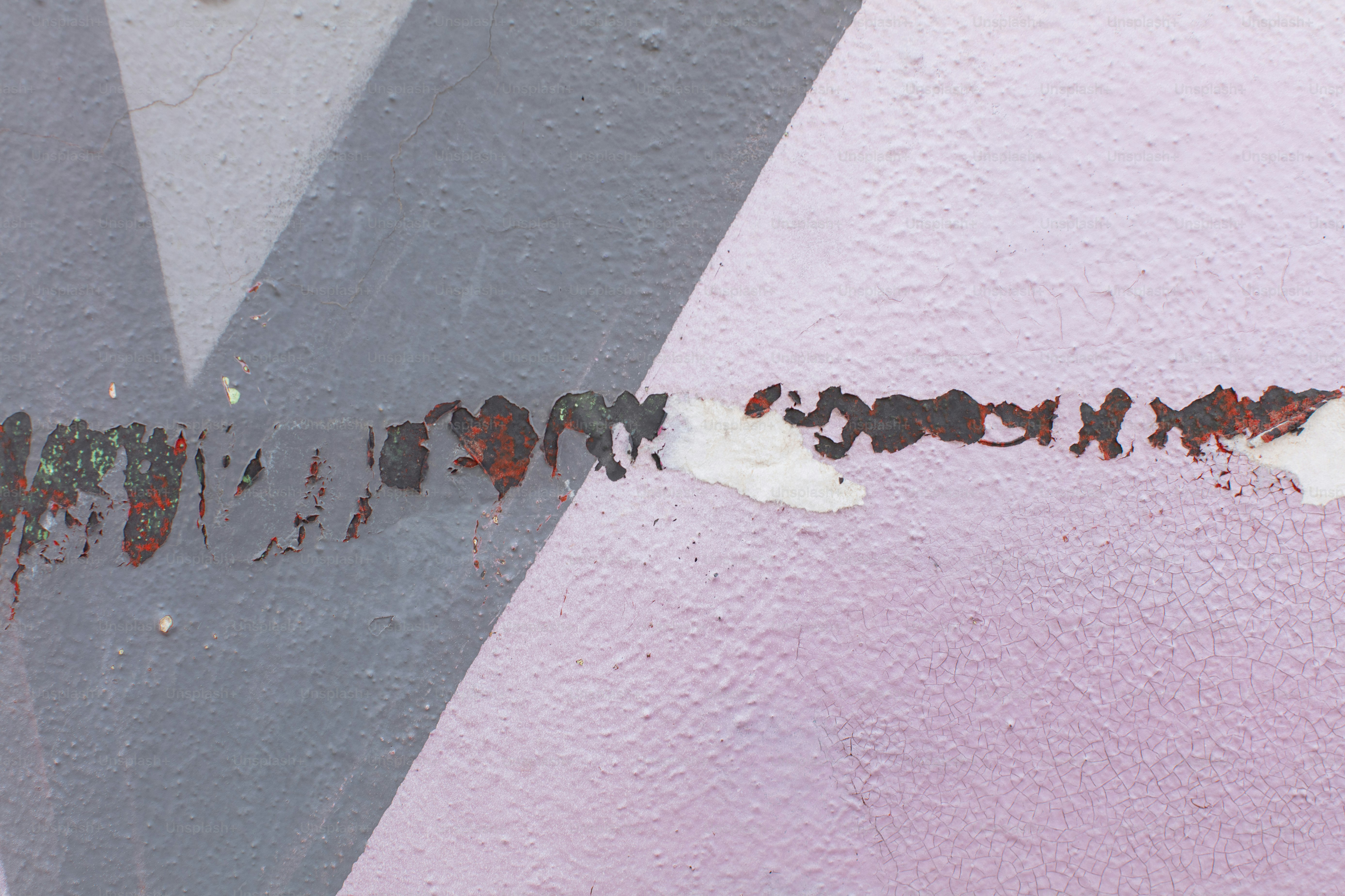 Distressed gray wall with torn paper remnants and texture - Photo on ...