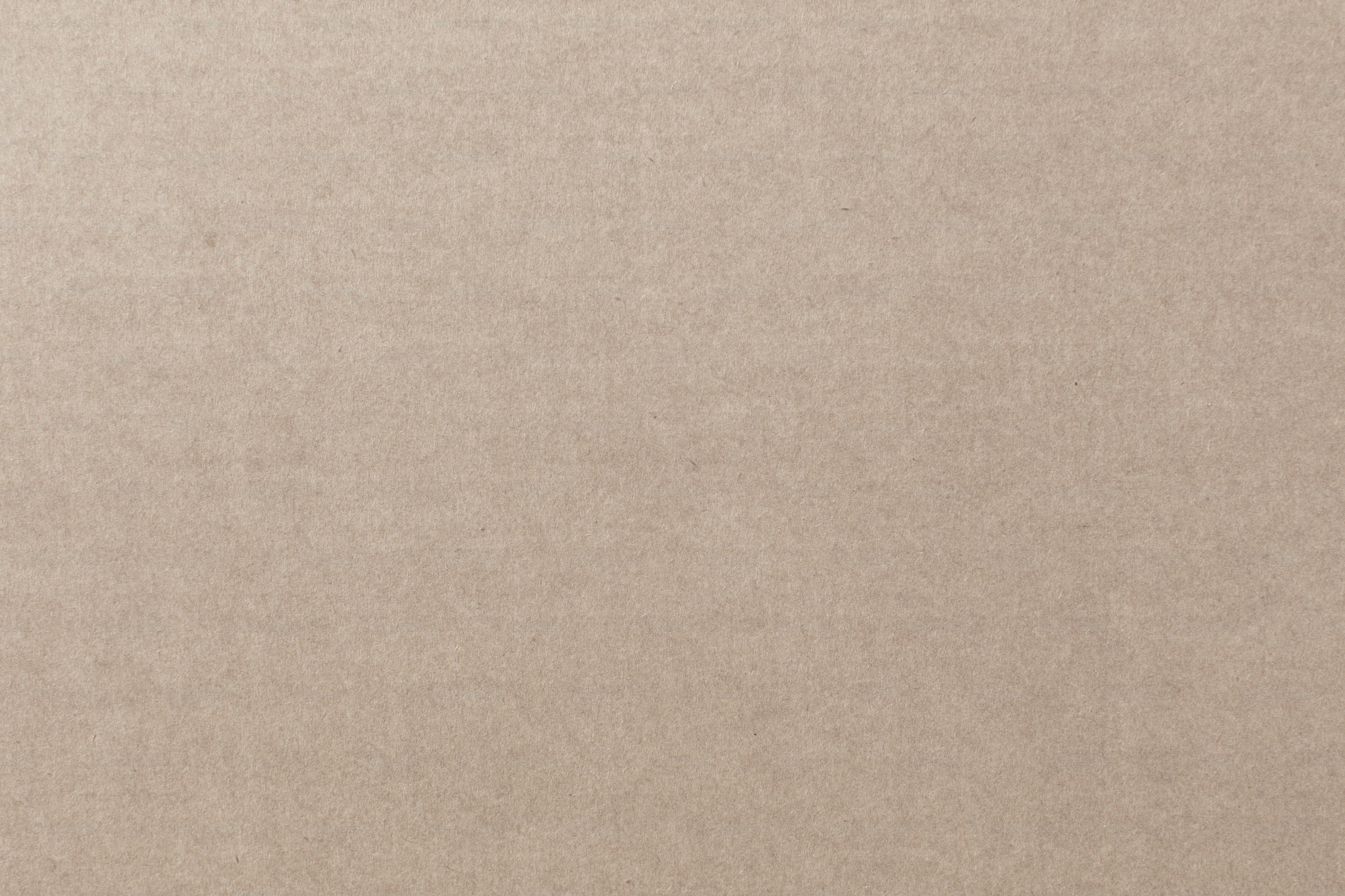 Texture solide en carton marron clair - Photo sur Unsplash+