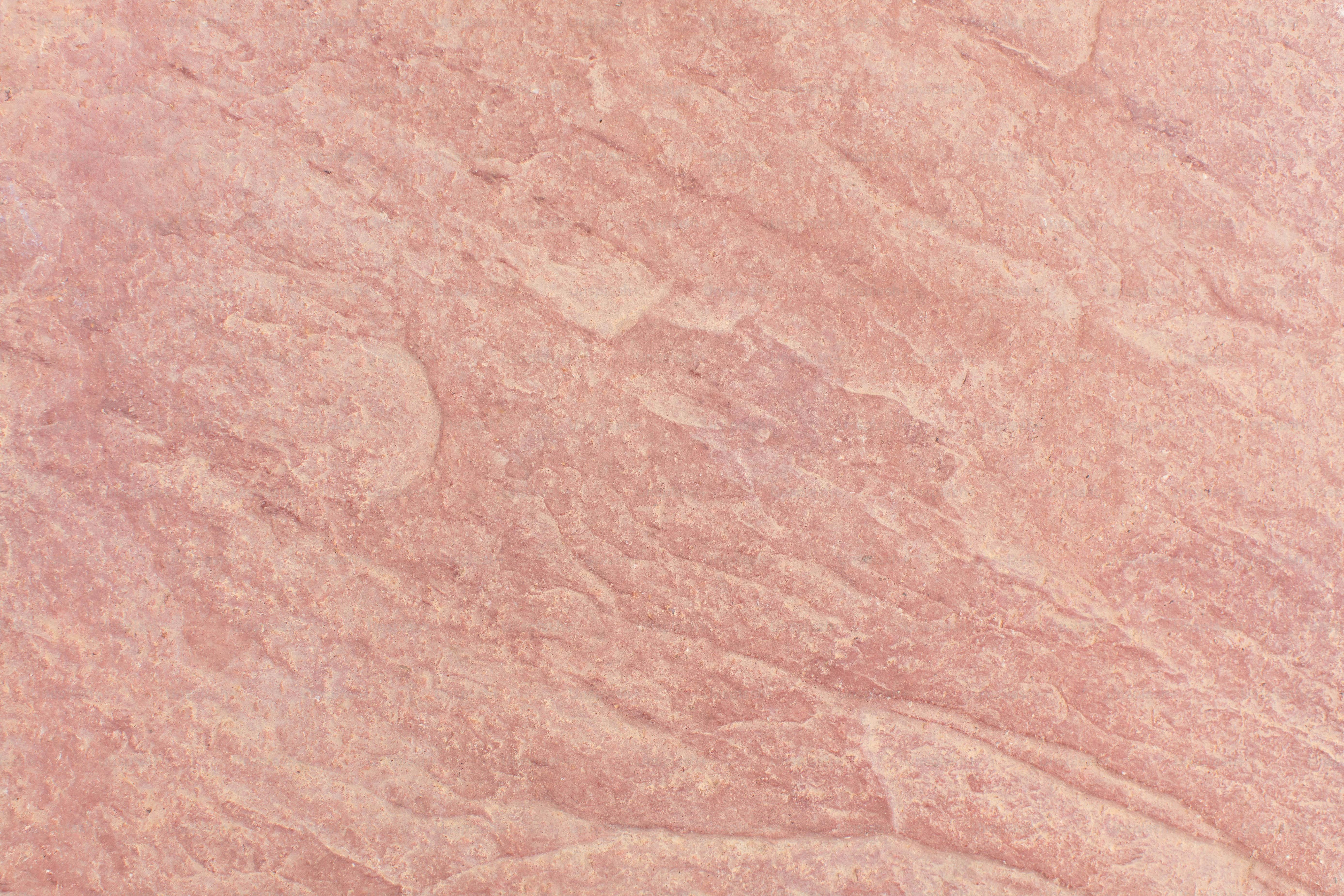 Textured light pink stone surface background - Photo on Unsplash+
