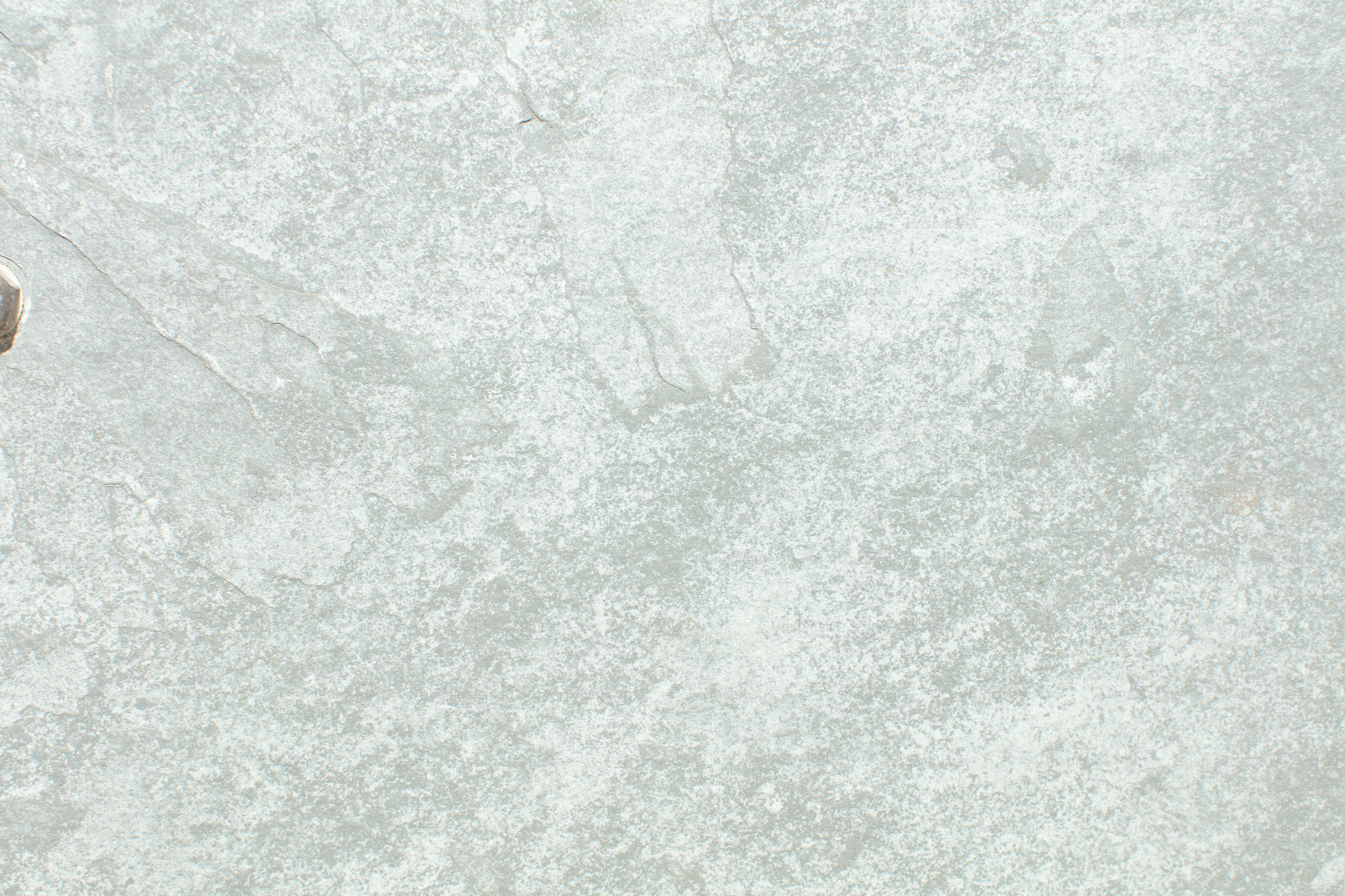 Textured light pink stone surface background - Photo on Unsplash+