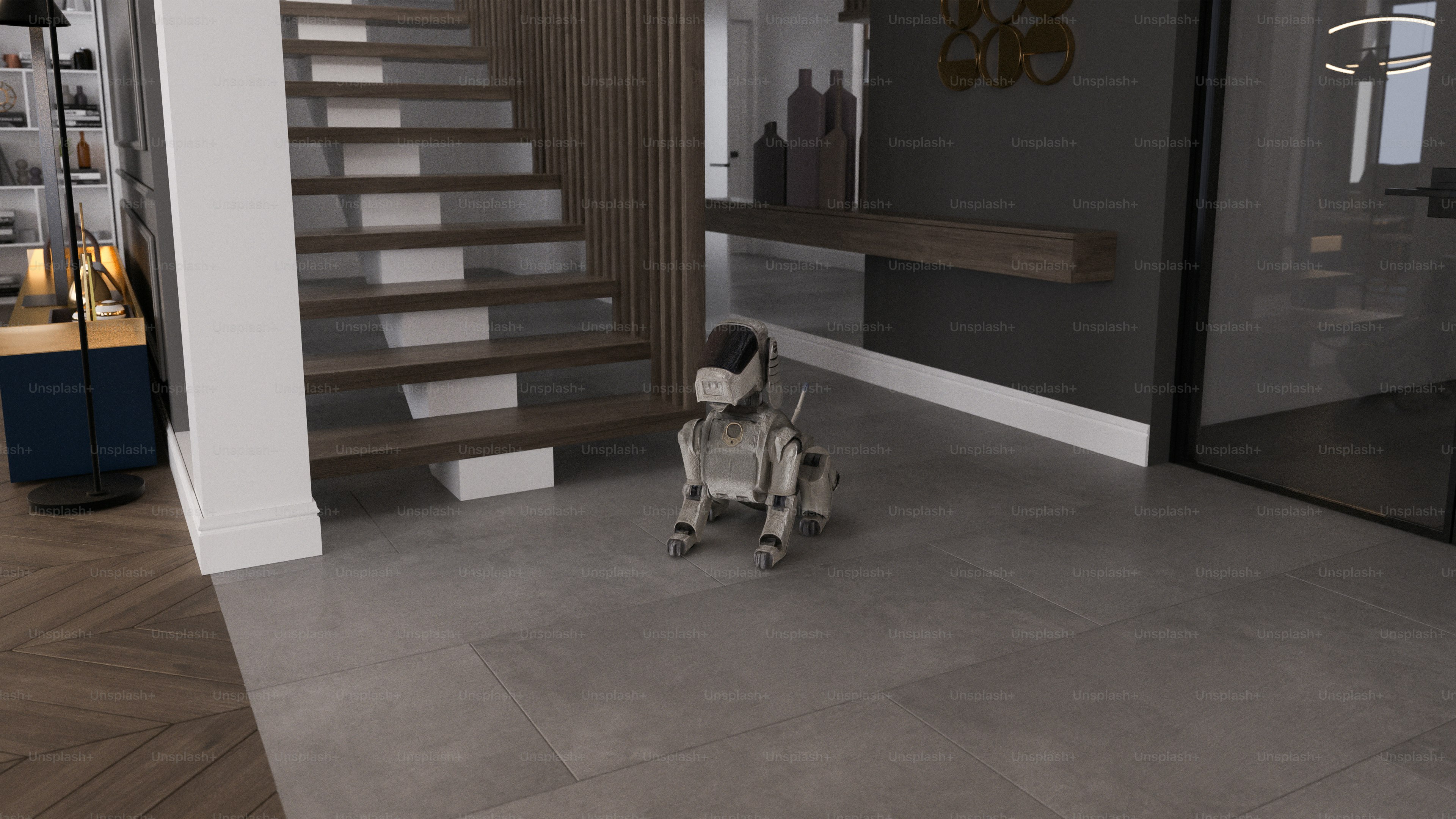 Seekor anjing robot duduk di lantai dekat tangga.