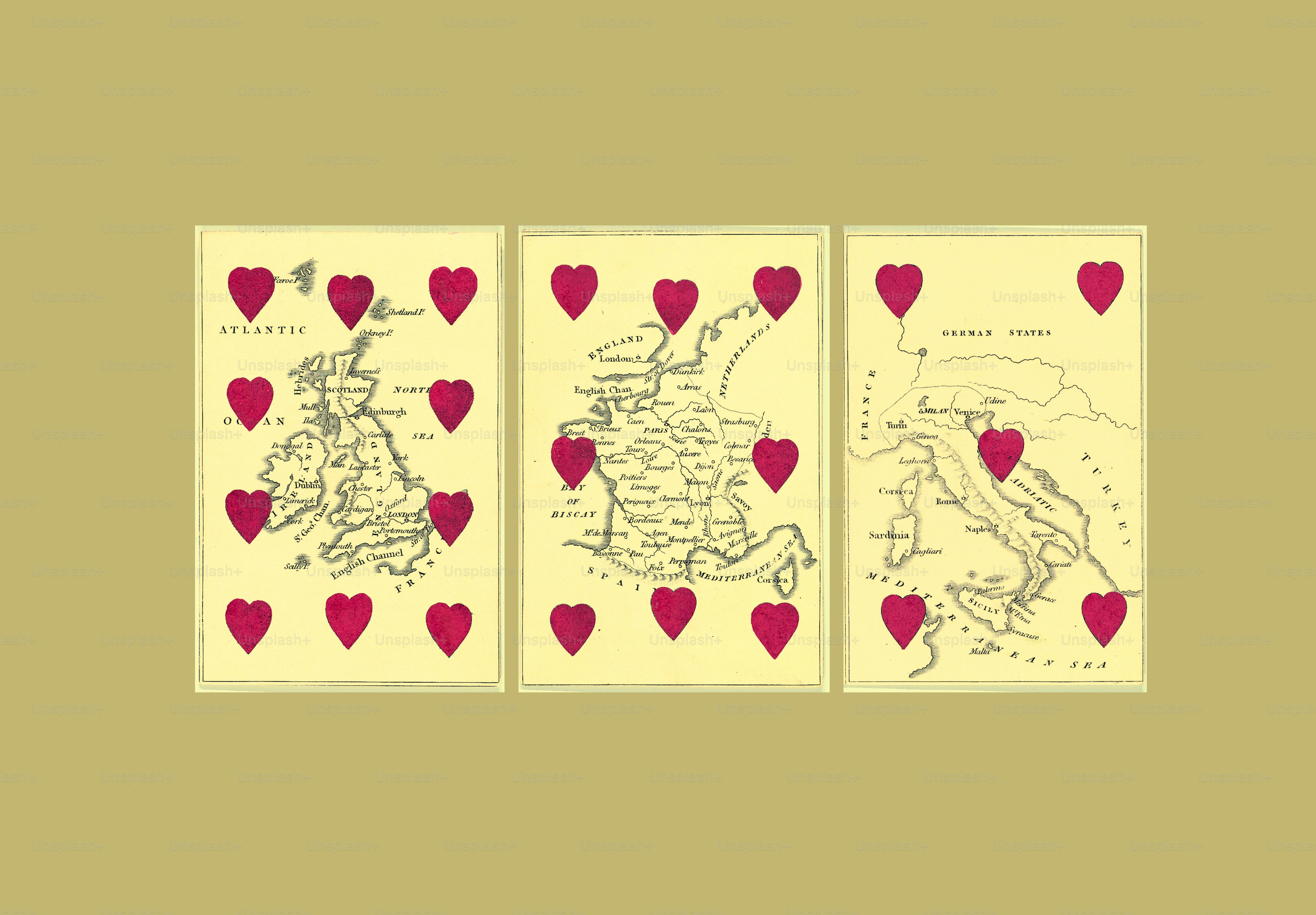Three playing cards with maps of europe and red hearts.