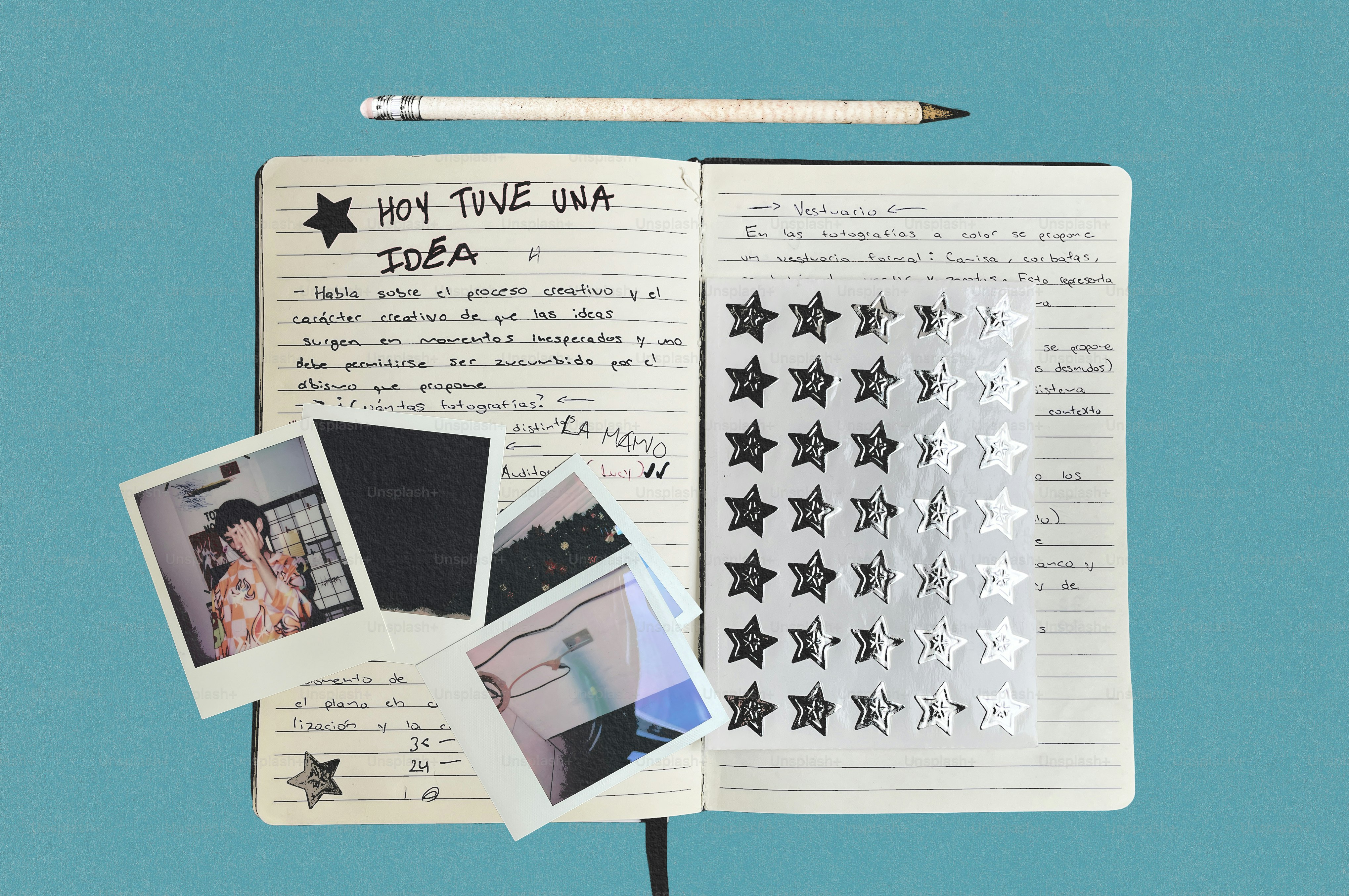 Handwritten diary open with a photo and decorative star stickers. photo ...