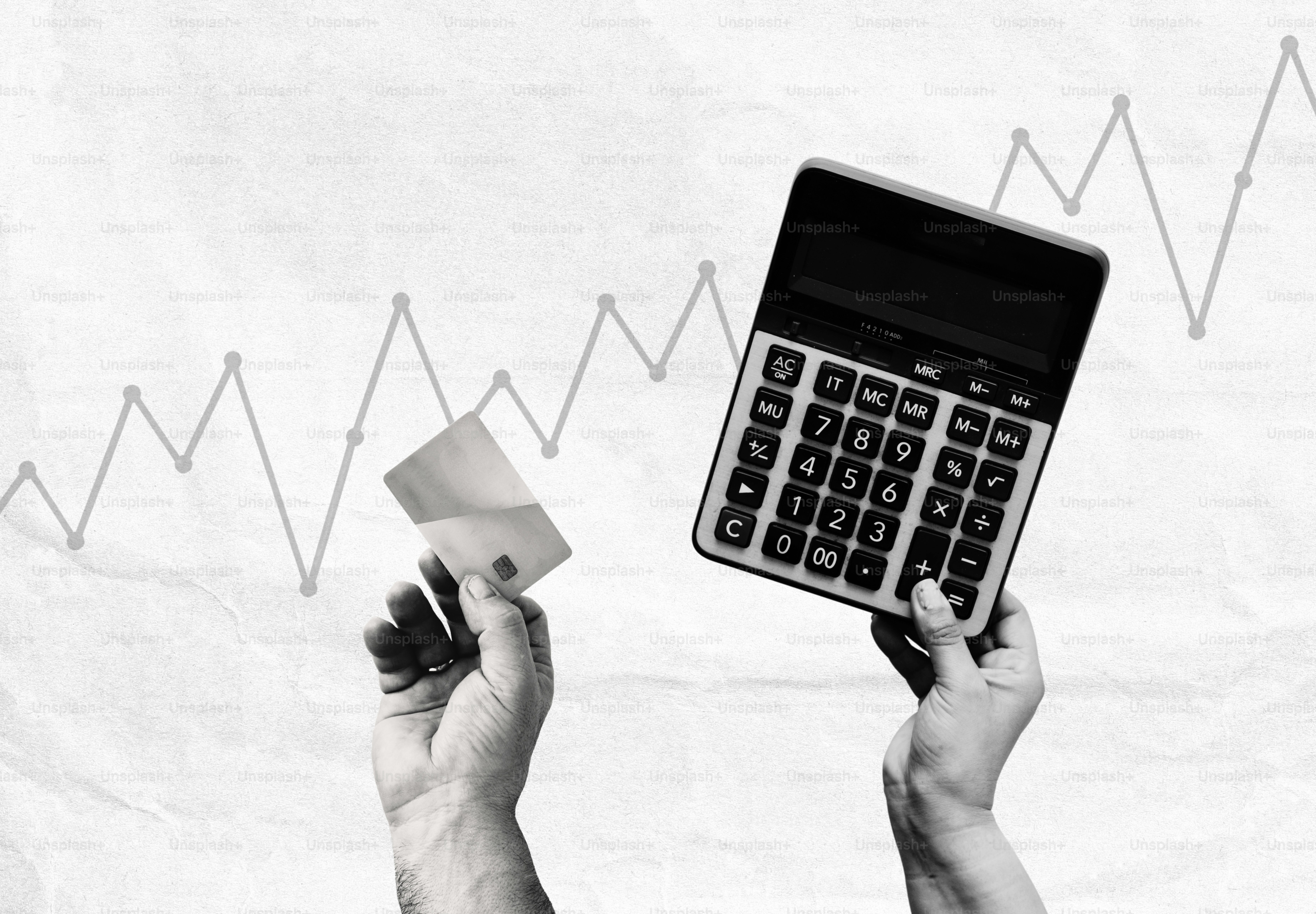 Hands holding credit card and calculator with a rising graph.
