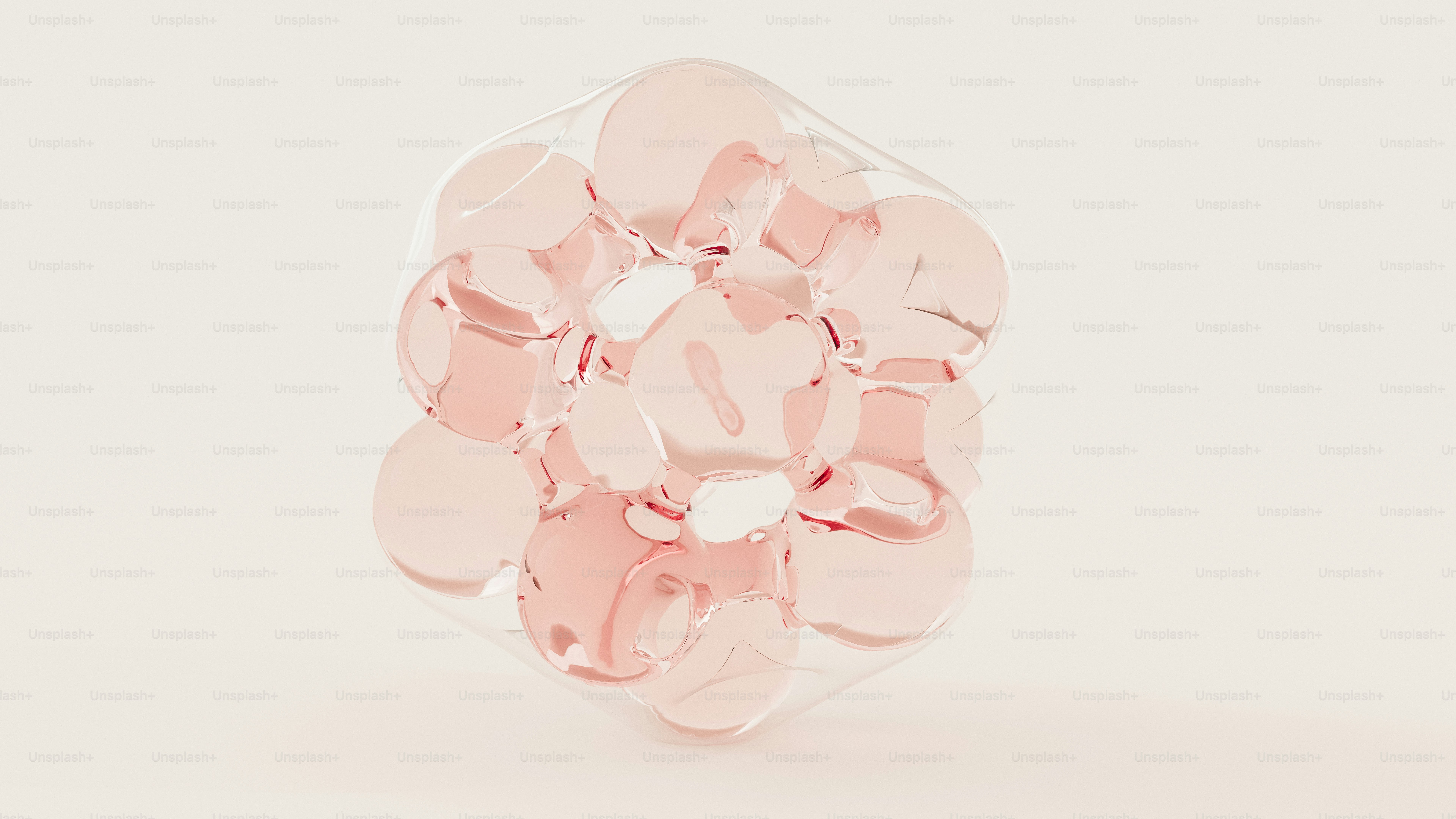Pink translucent spheres forming a geometric cluster.