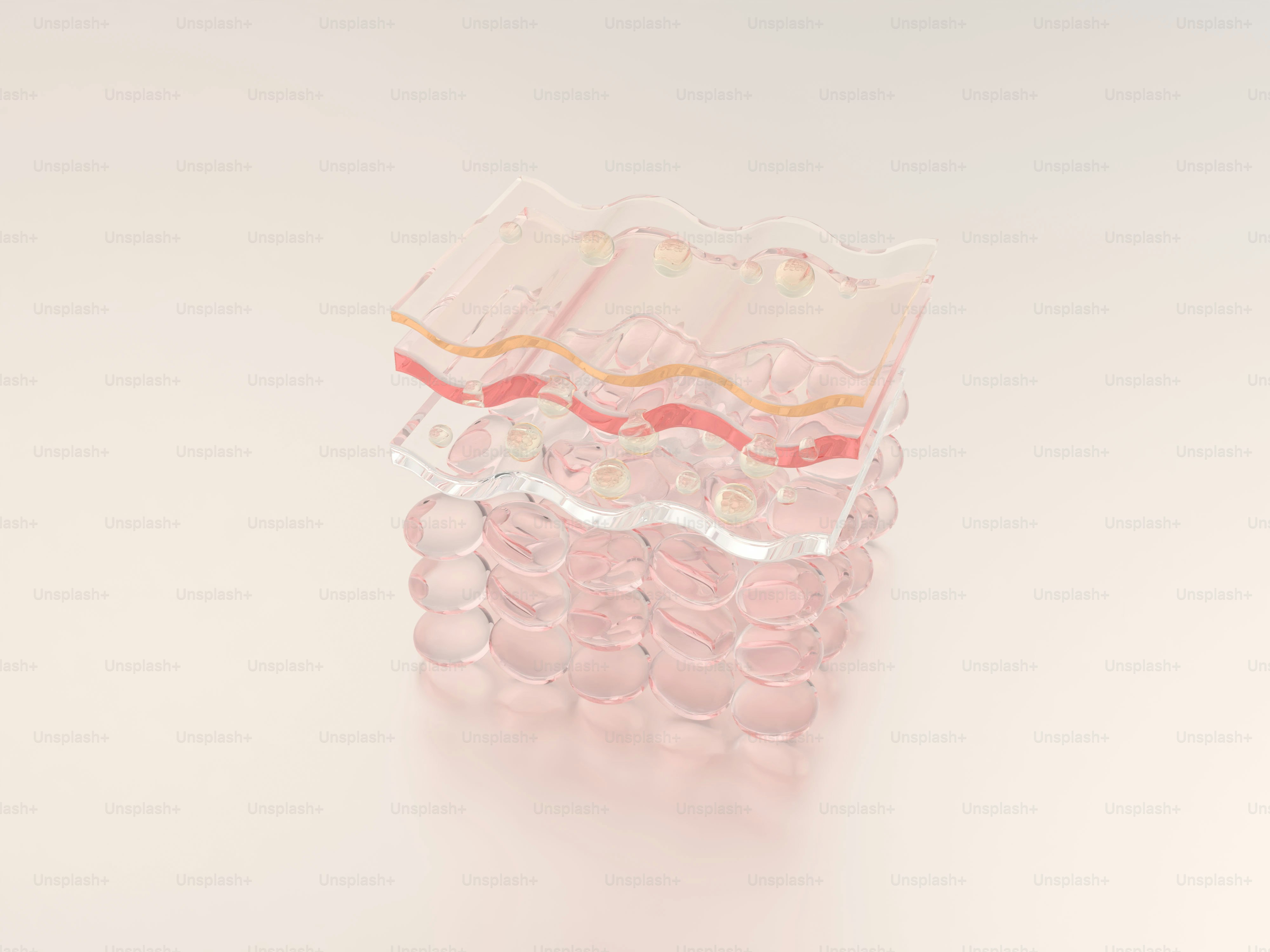 Stacked clear wavy objects with subtle pink and red hues.