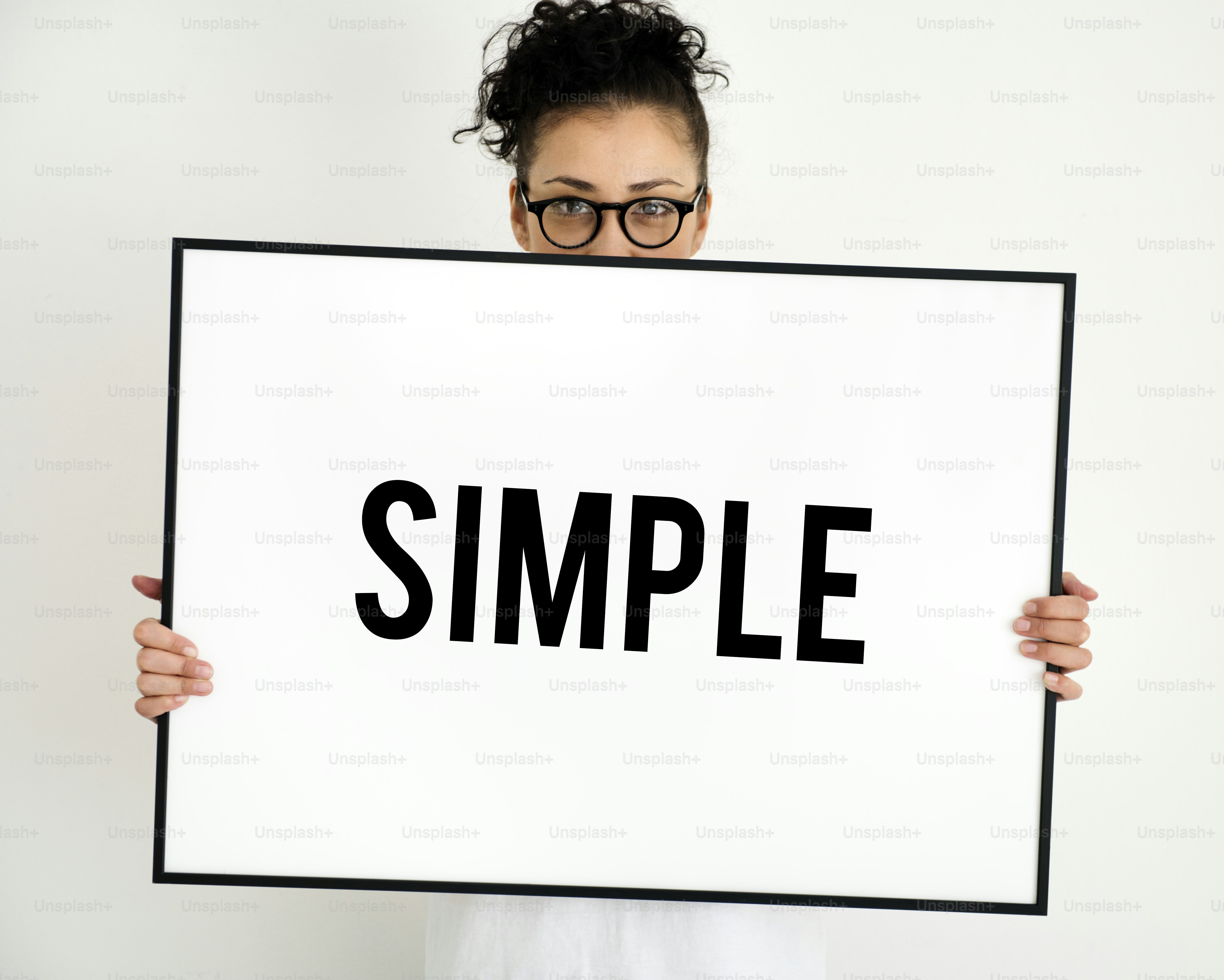 Woman holding paper board