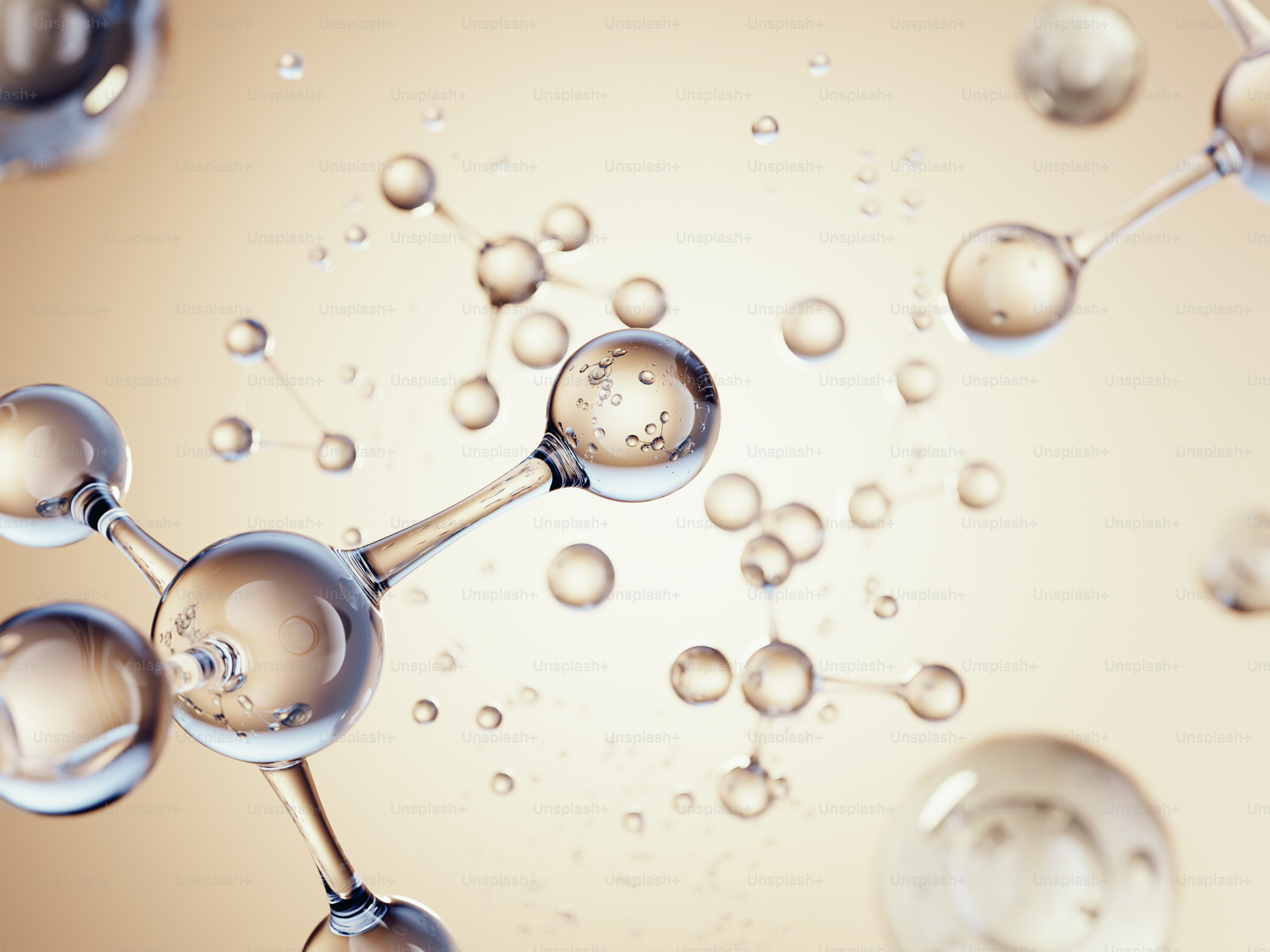 Glass molecules and water droplets on a light brown background.