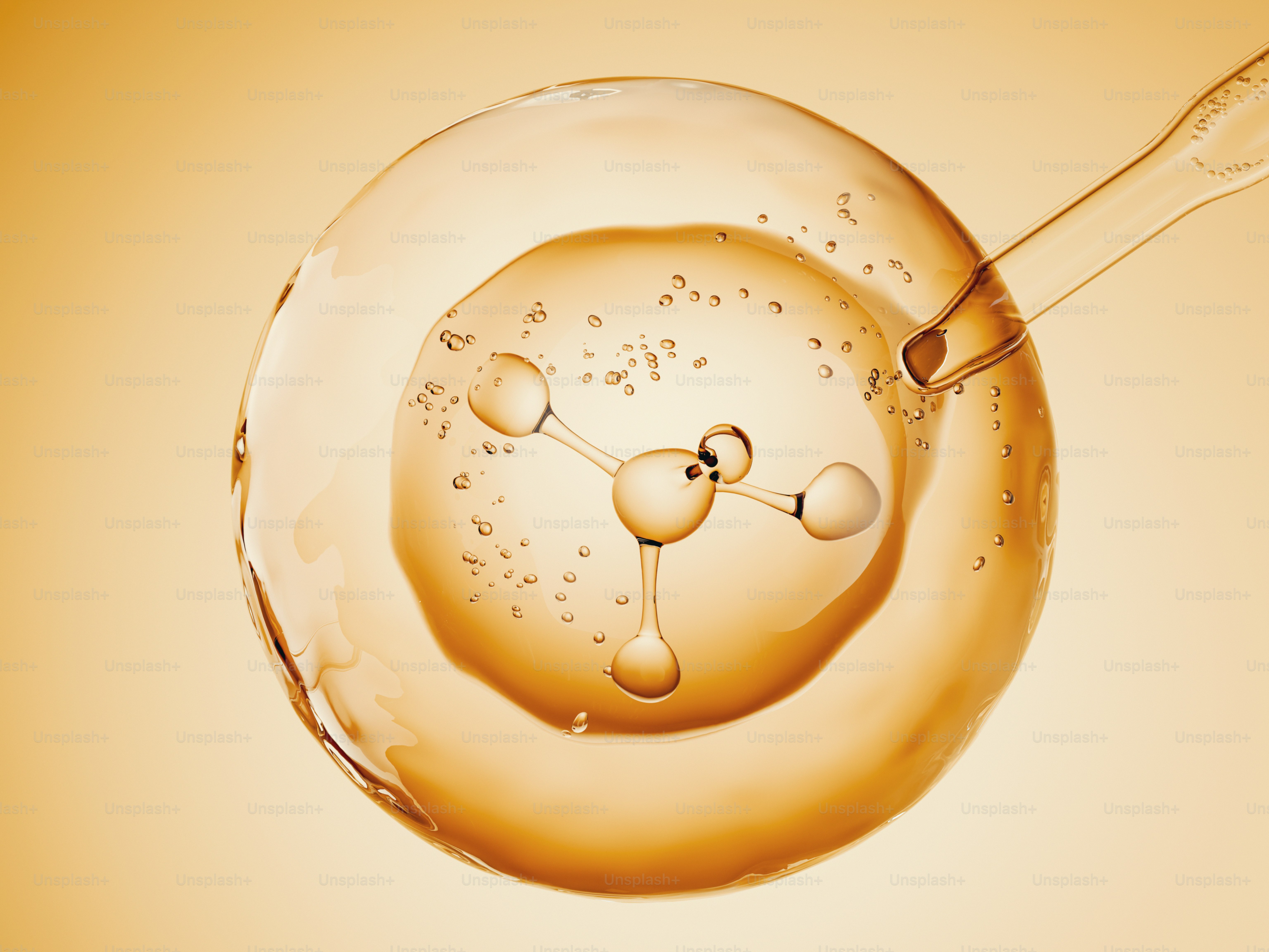A pipette injecting into a sphere containing a molecular structure.