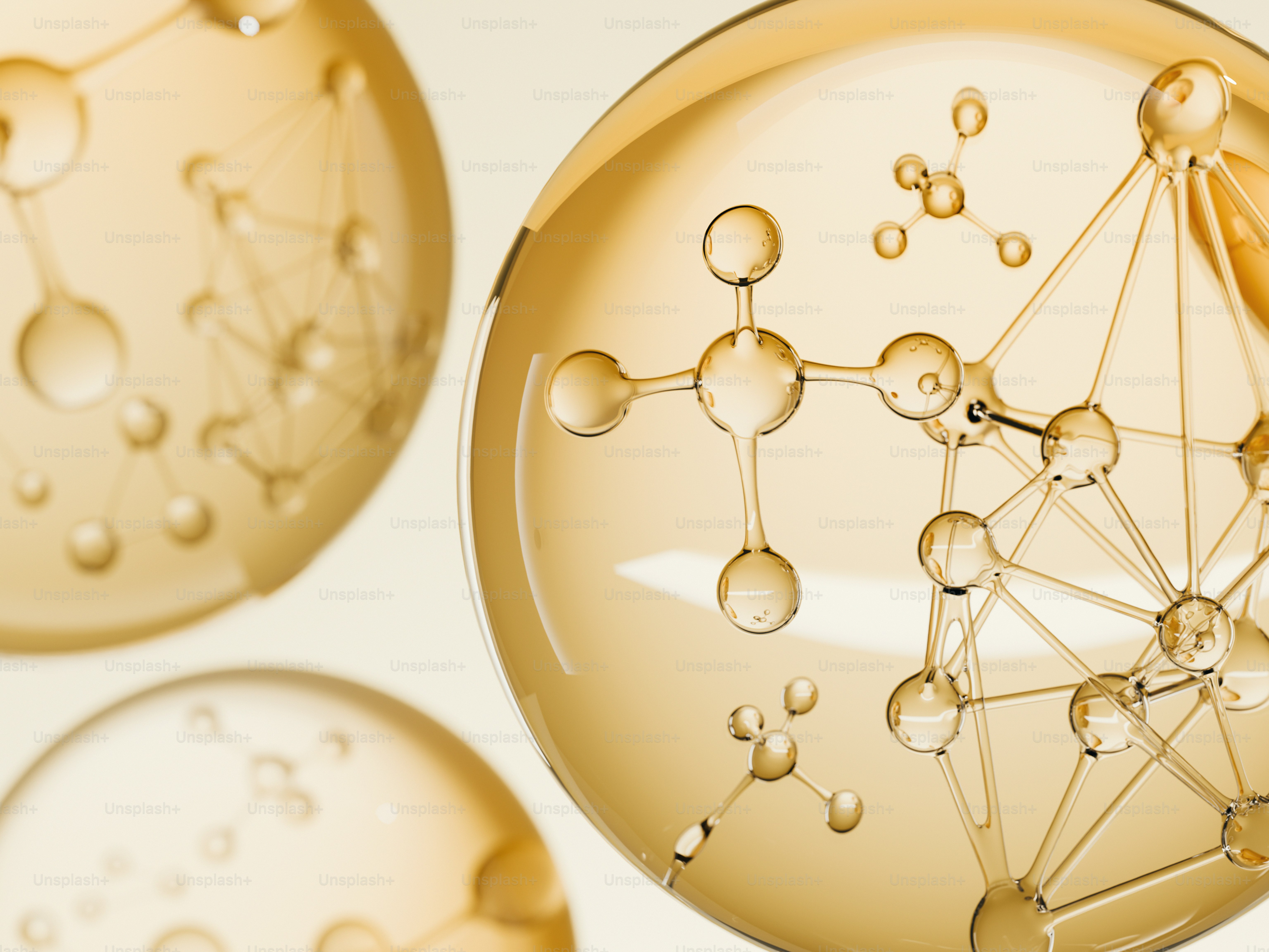 Golden spheres with molecular structures inside.