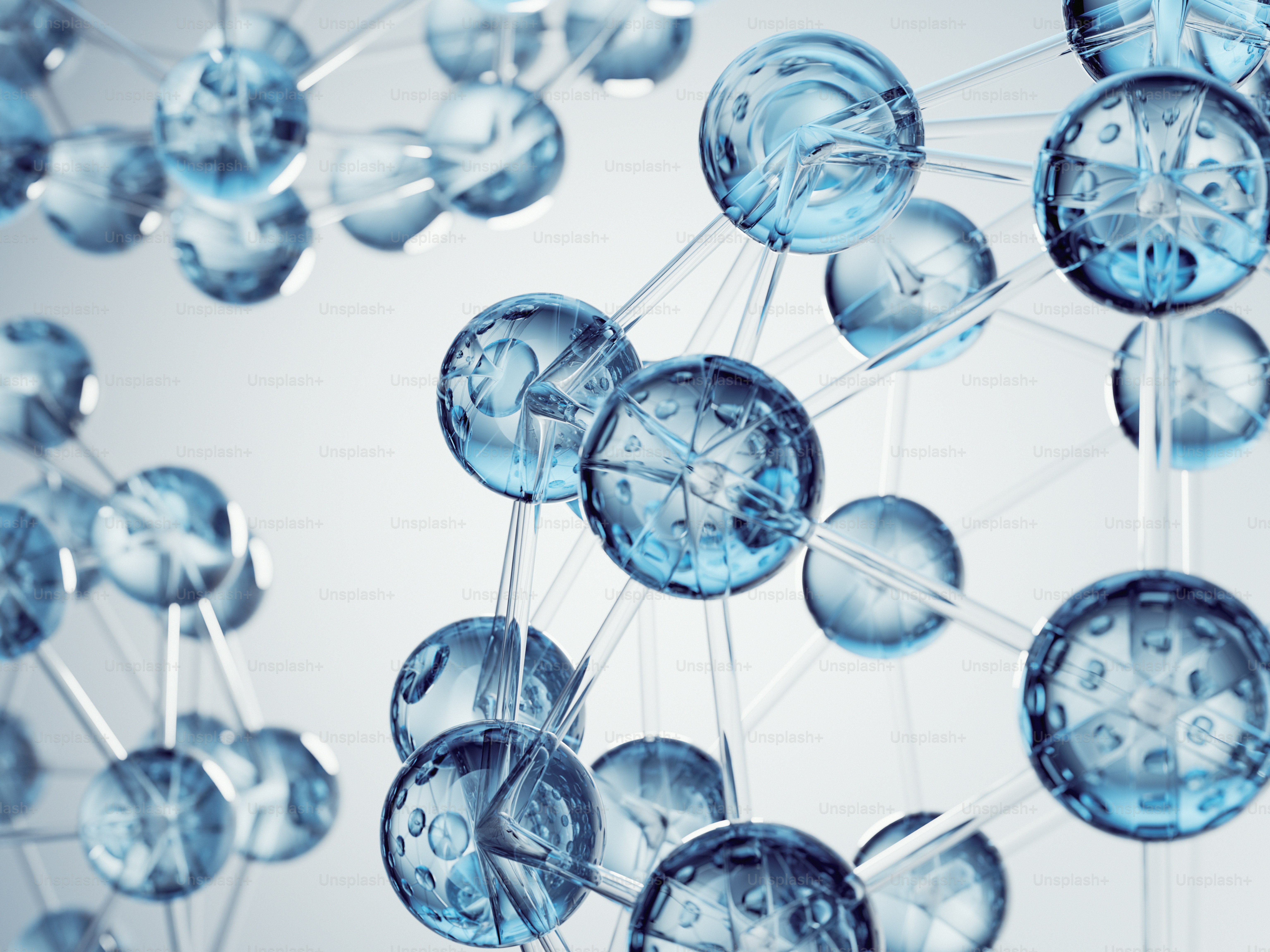 Blue and clear spheres forming a molecular structure.
