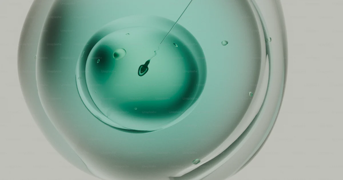 Cellular Stack Icon Syringe injecting green liquid into a cell containing a sperm - Photo ...