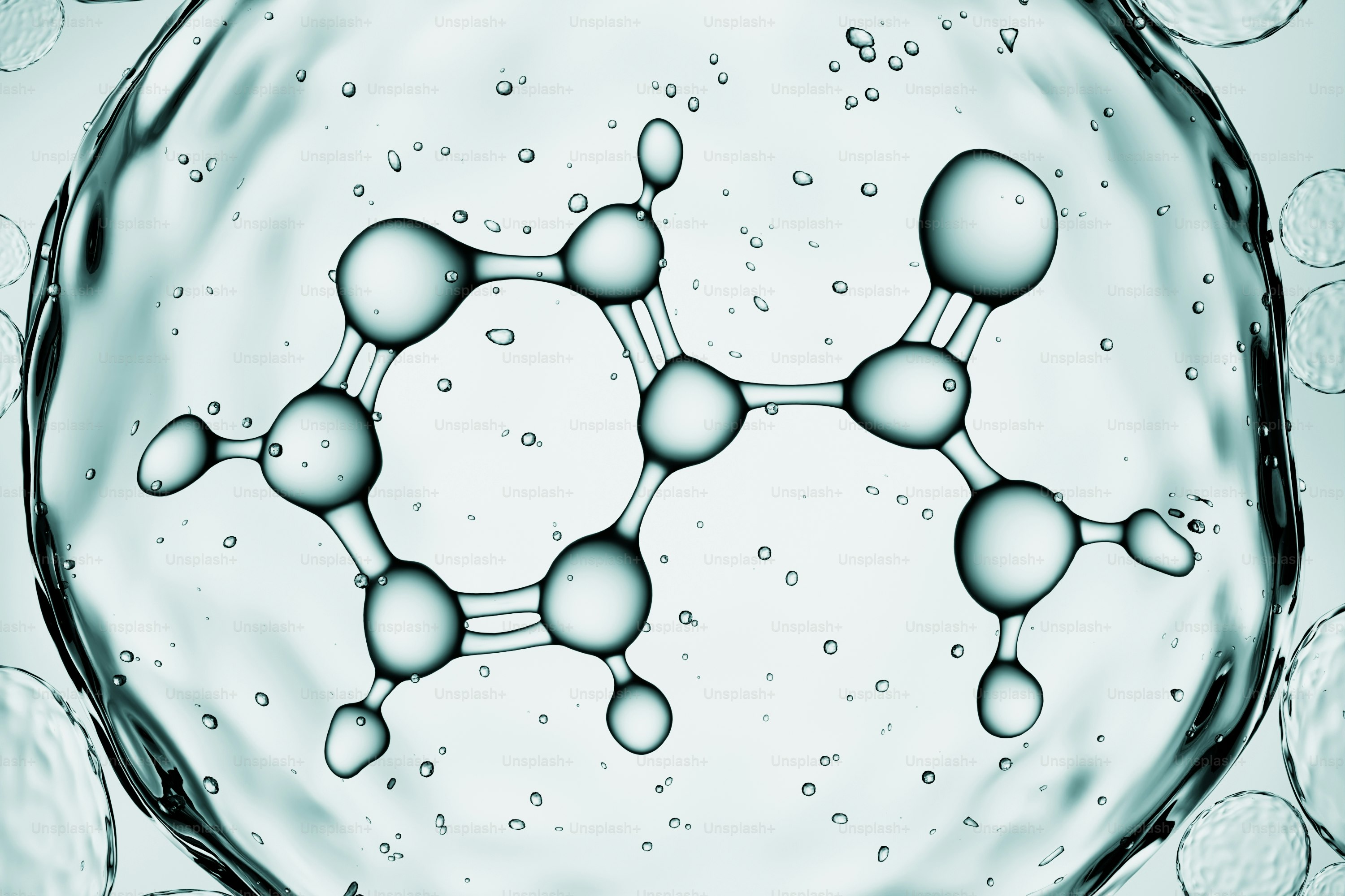 Molecular structure encased in a translucent liquid bubble.