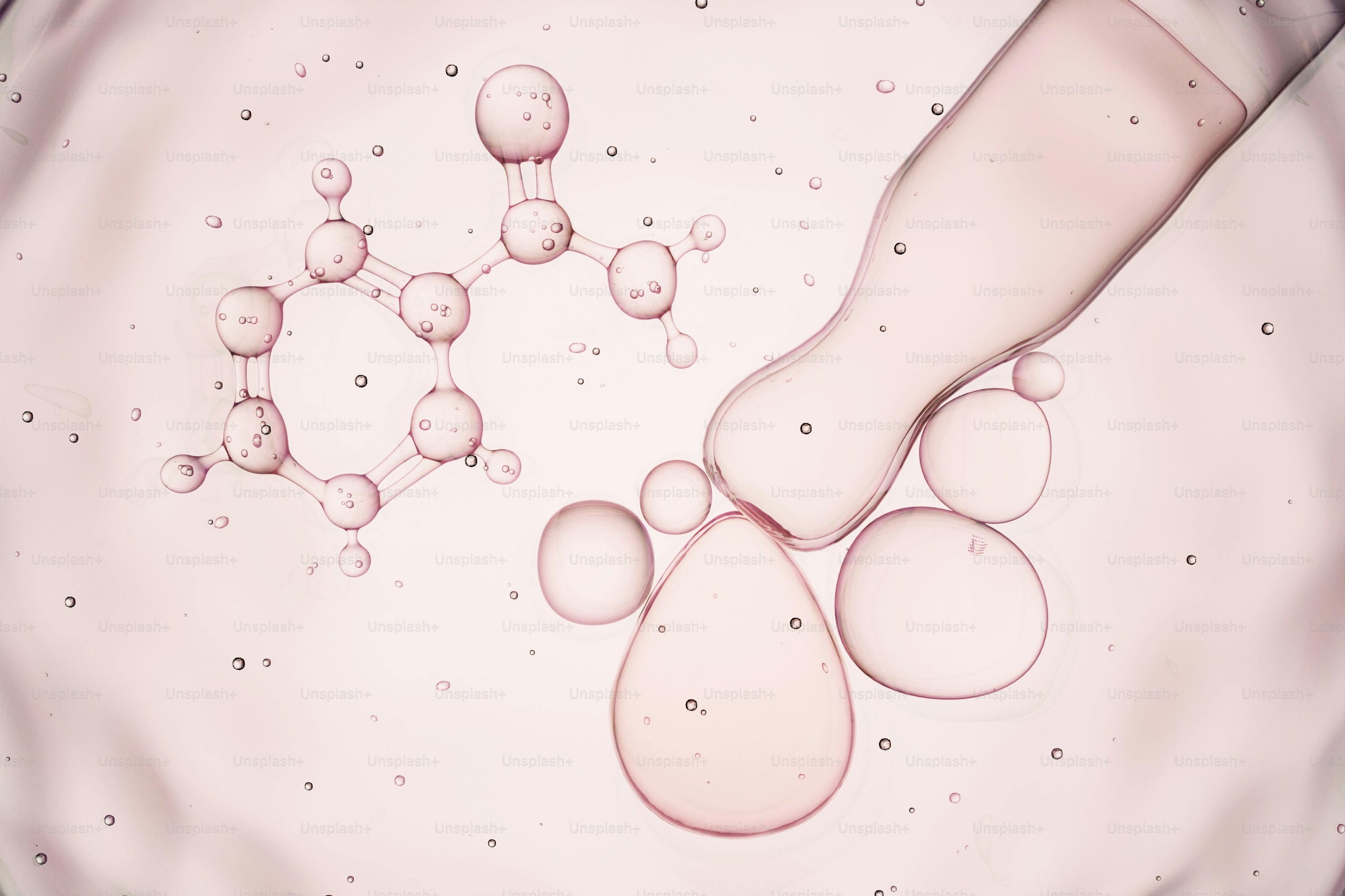A dropper dispensing liquid drops next to a molecular structure.
