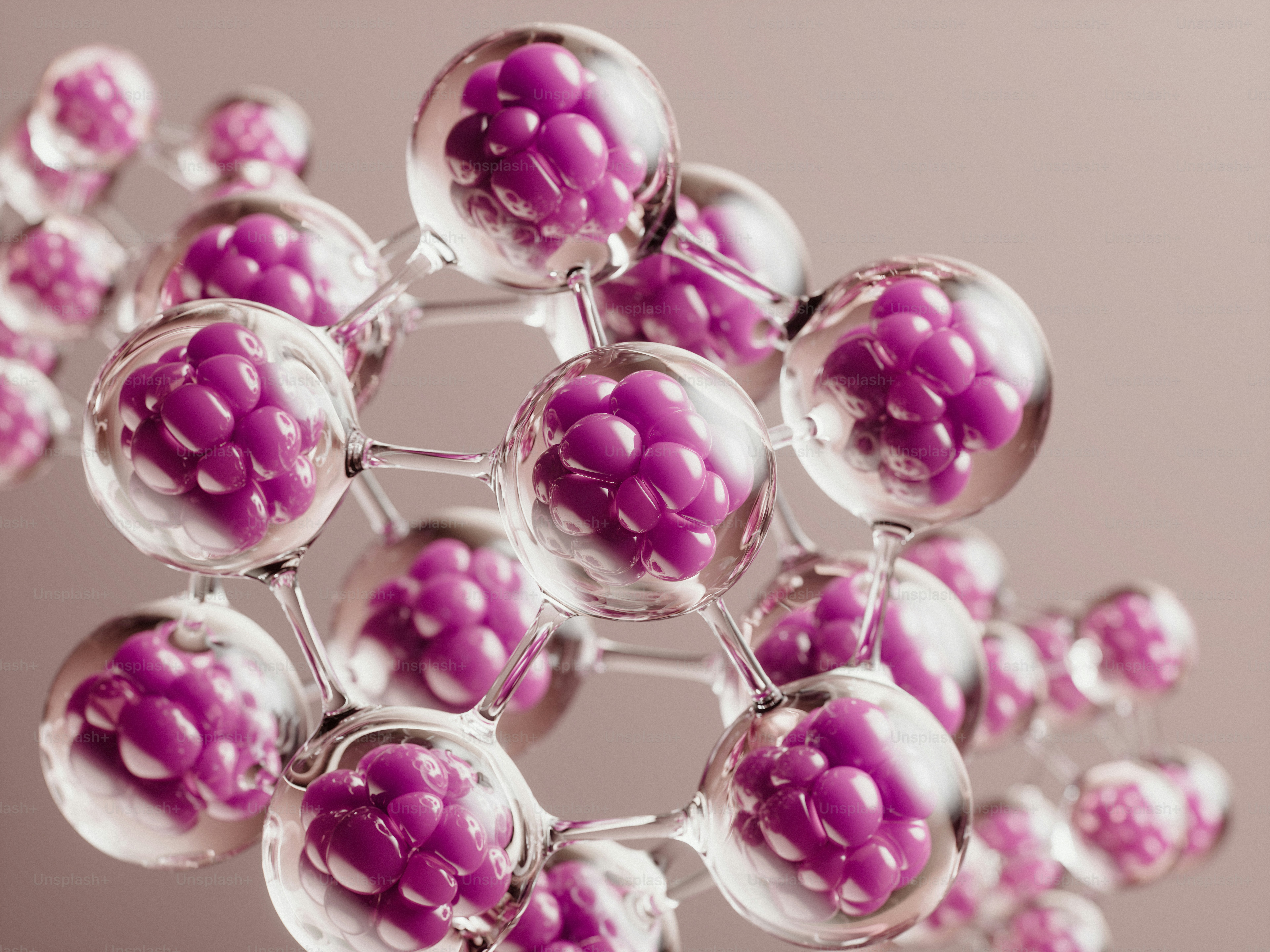 Clear spheres containing purple particles in an abstract molecular structure