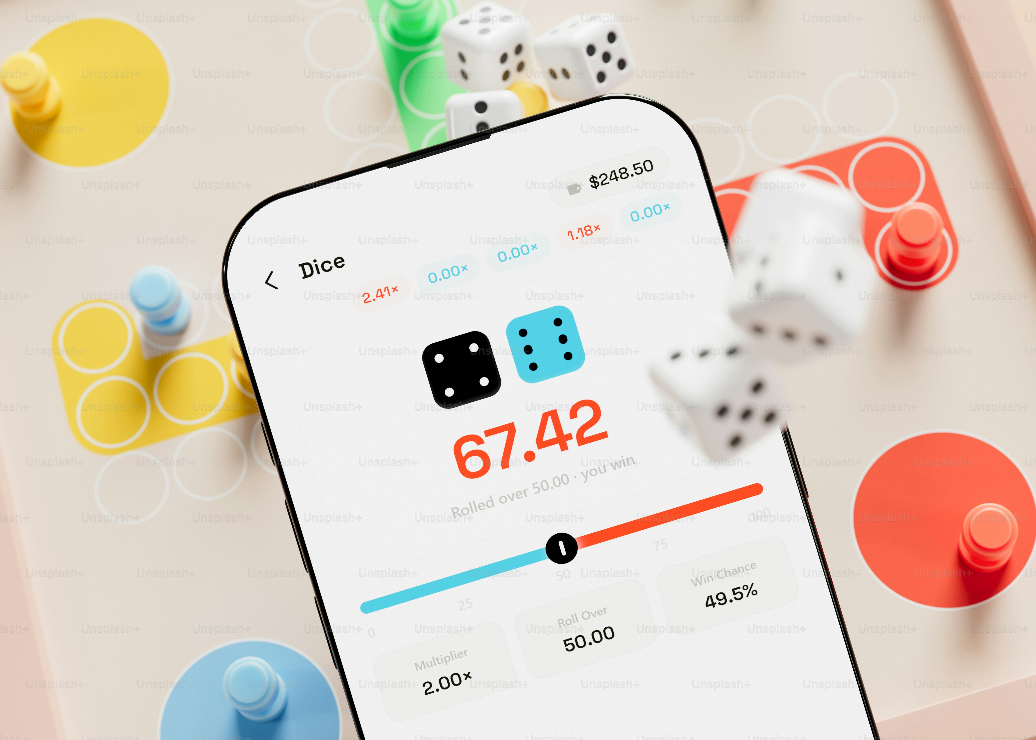 Smartphone displaying dice game with ludo pieces and physical dice