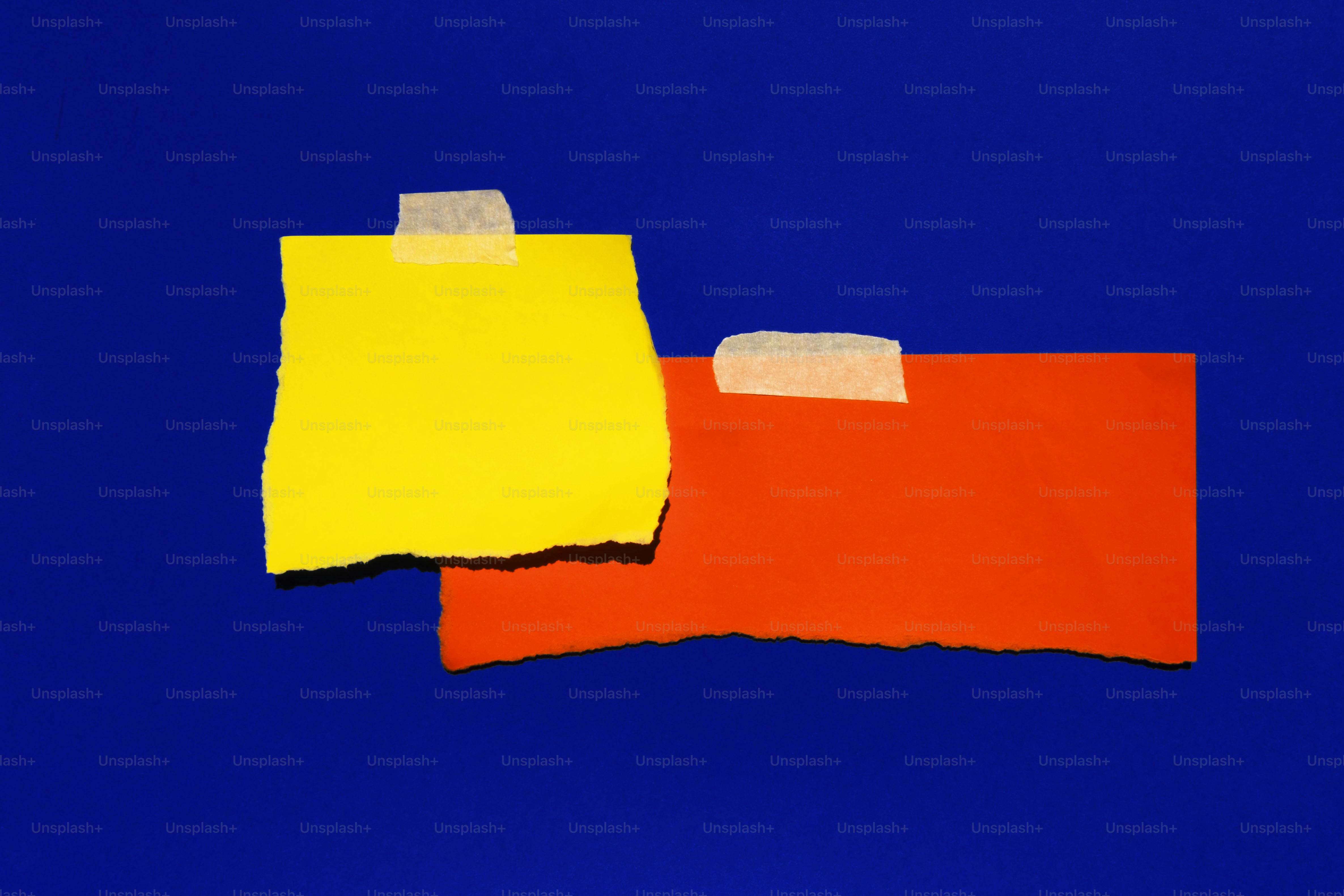 A torn piece of handwritten paper on crumpled blue background. photo ...