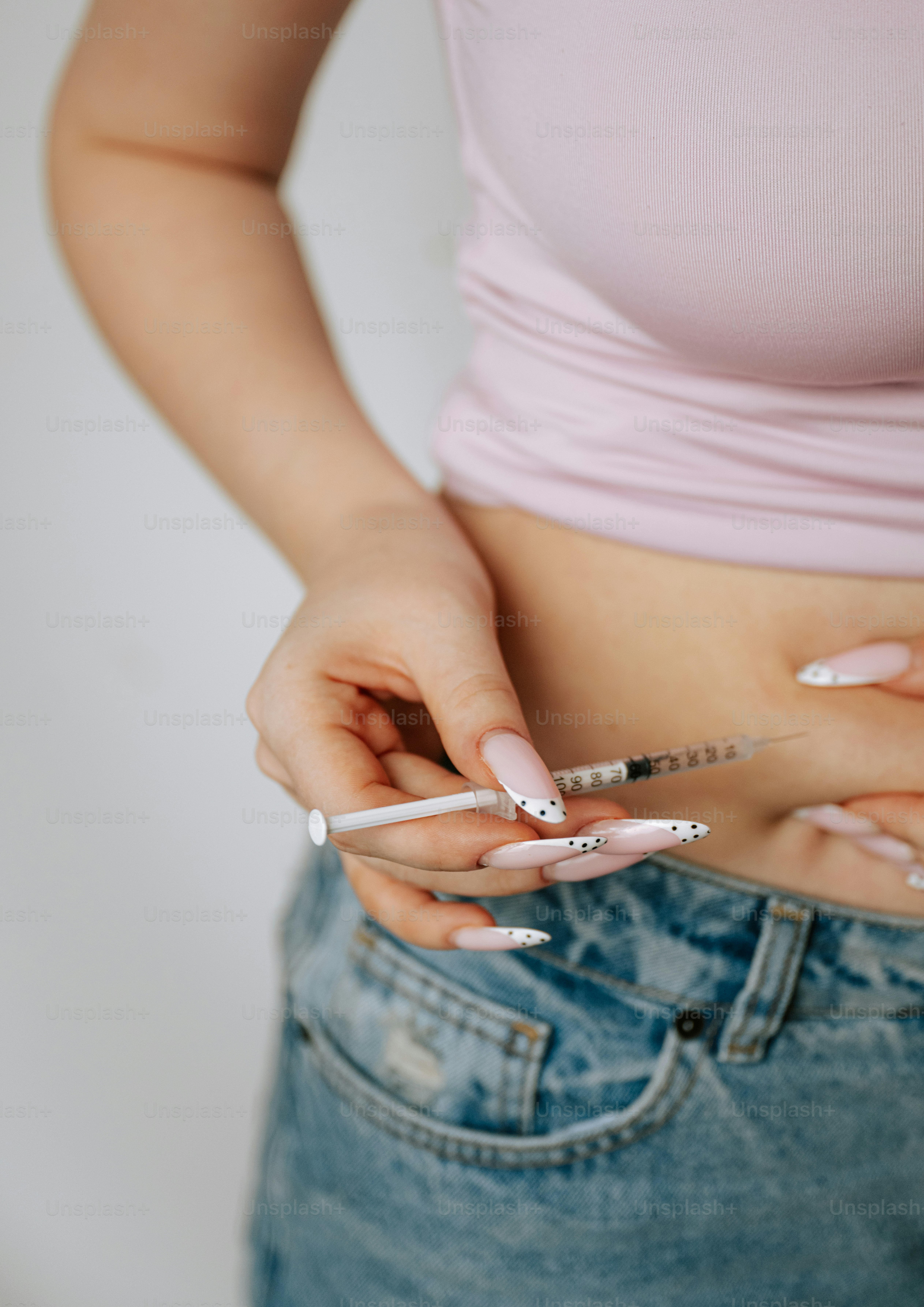 cigarette in belly button Kids Exposed to Smoke Utero Had Better Lung Function If Moms Popped Vitamin C A girl standing on a