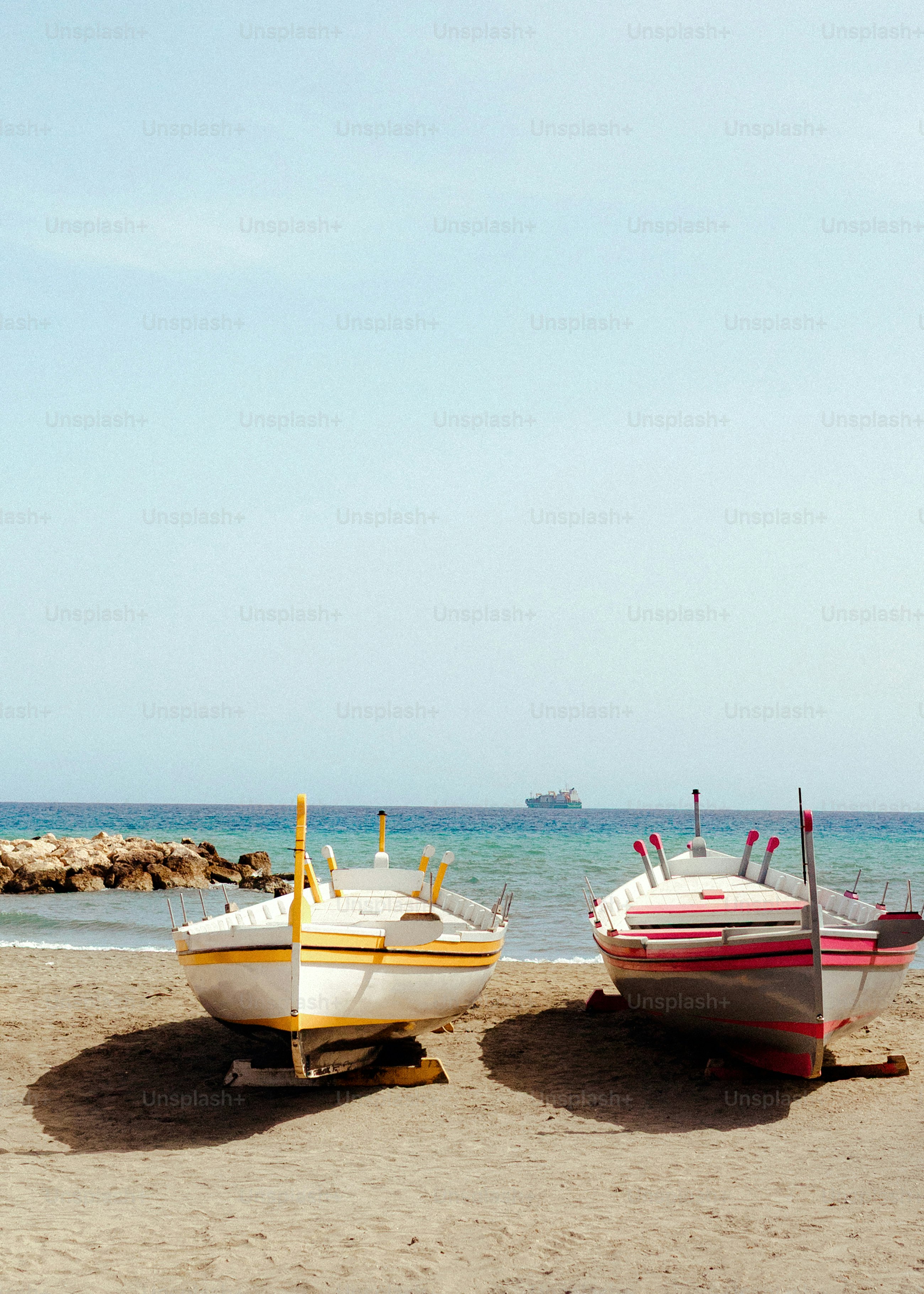 Colorful fishing boats on sandy beach