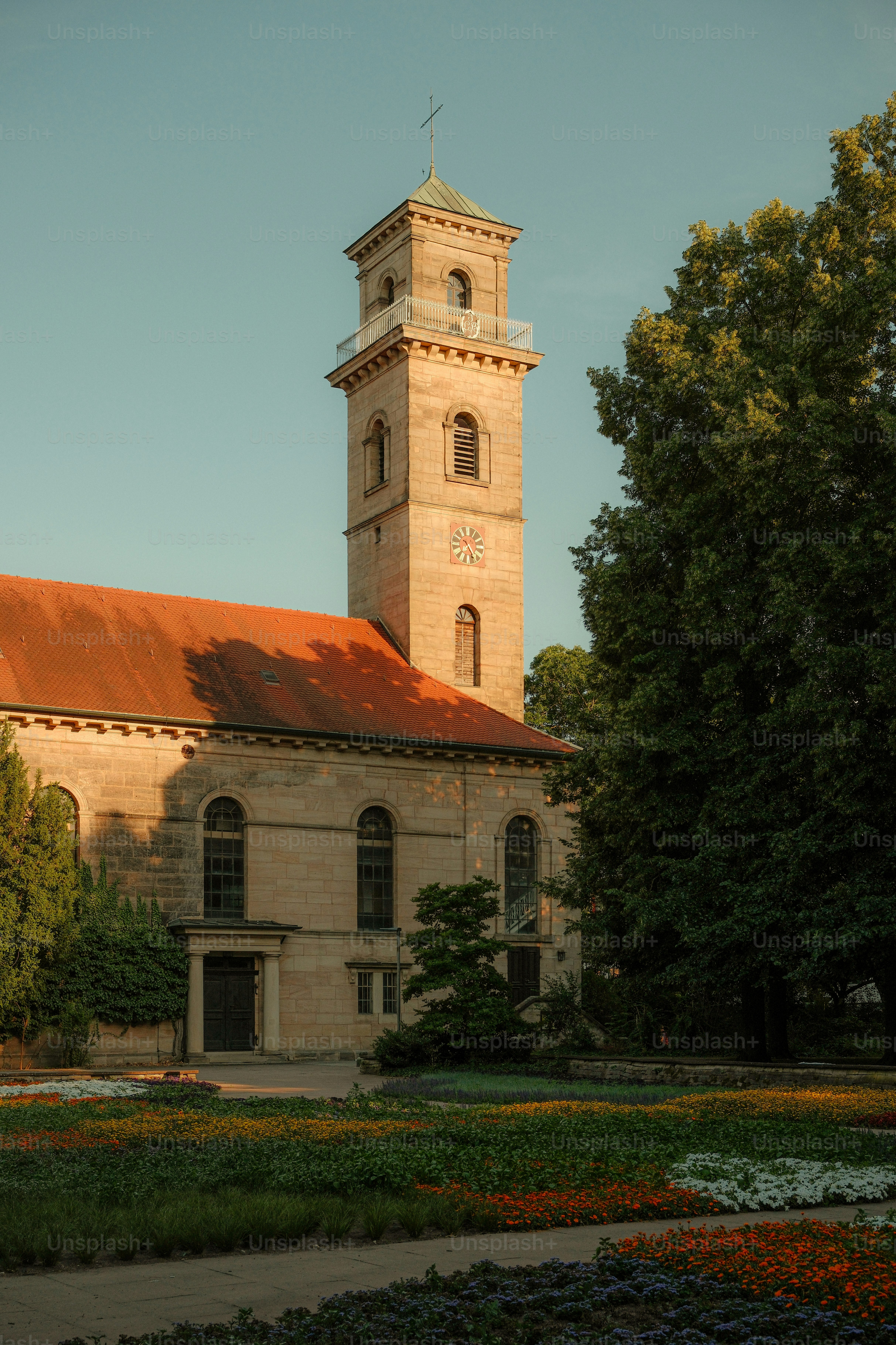 Fürth church tower and colorful flower beds