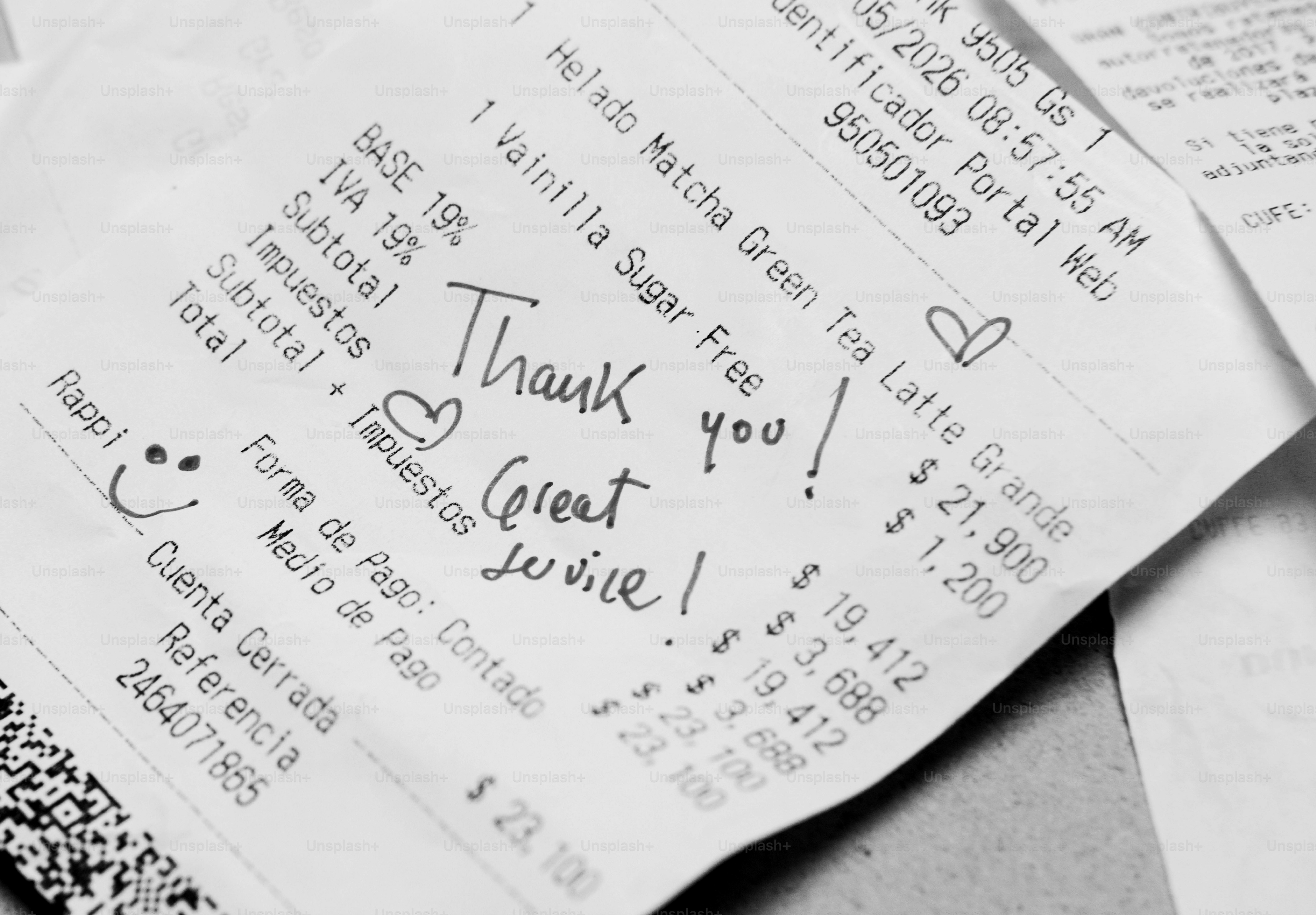 Crumpled receipt with handwritten "thank you!" and "great service!"