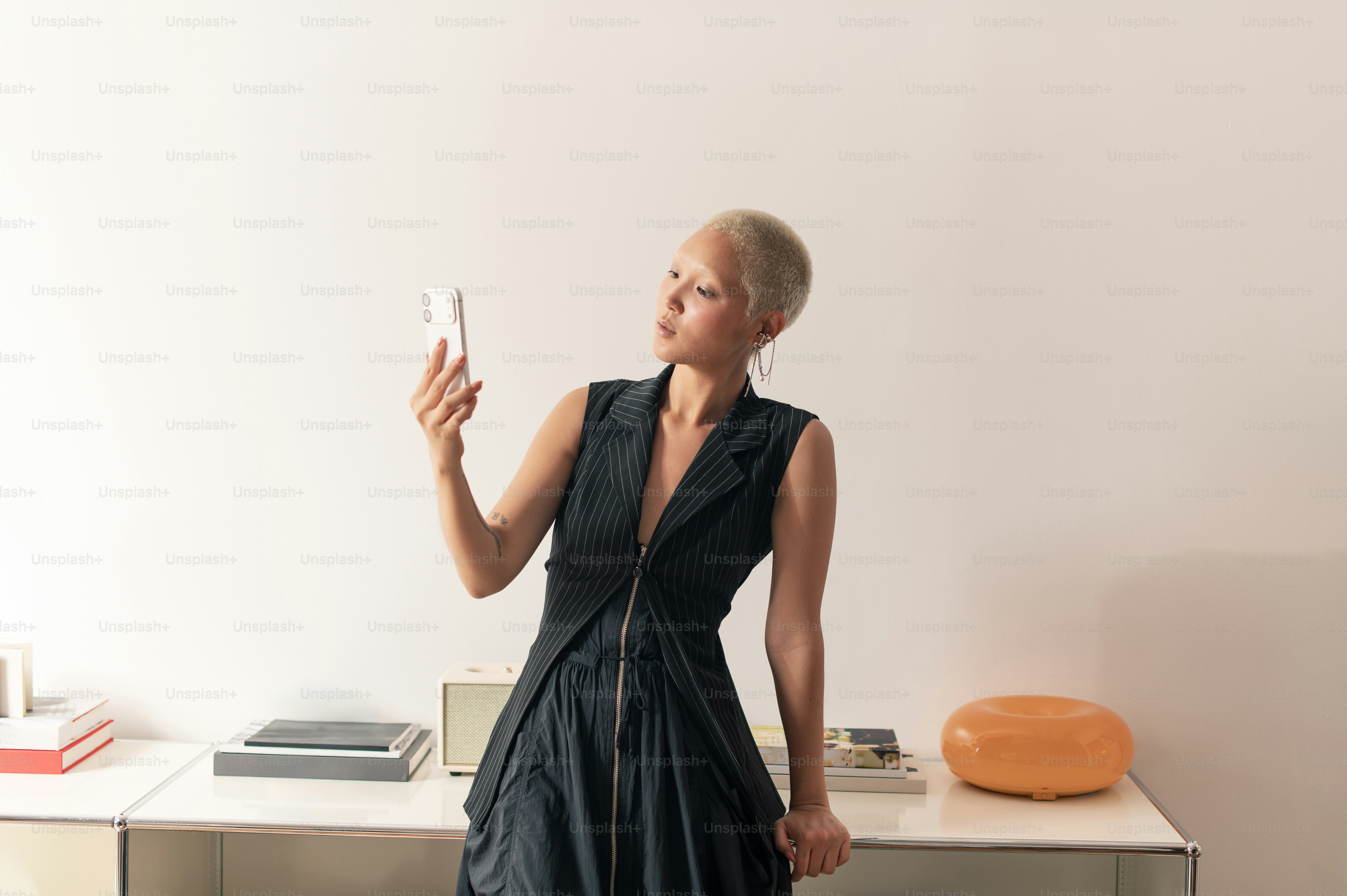 Woman taking a selfie with a smartphone
