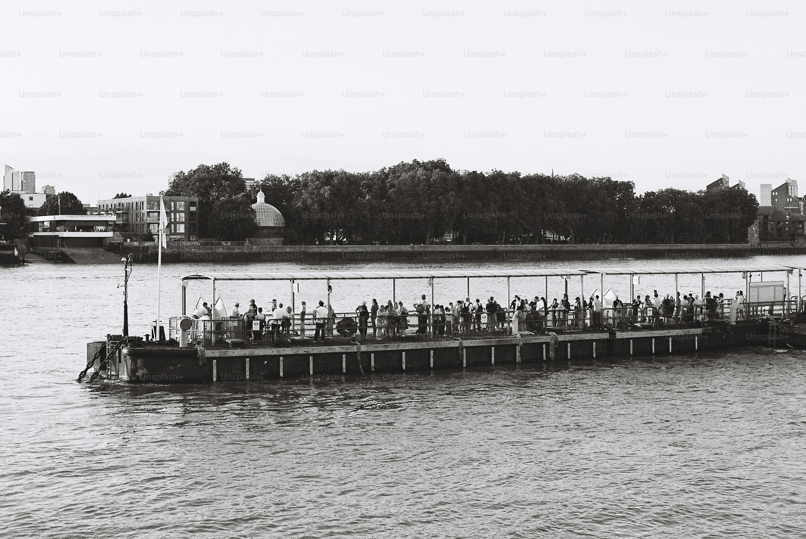 Crowd of people on a river barge