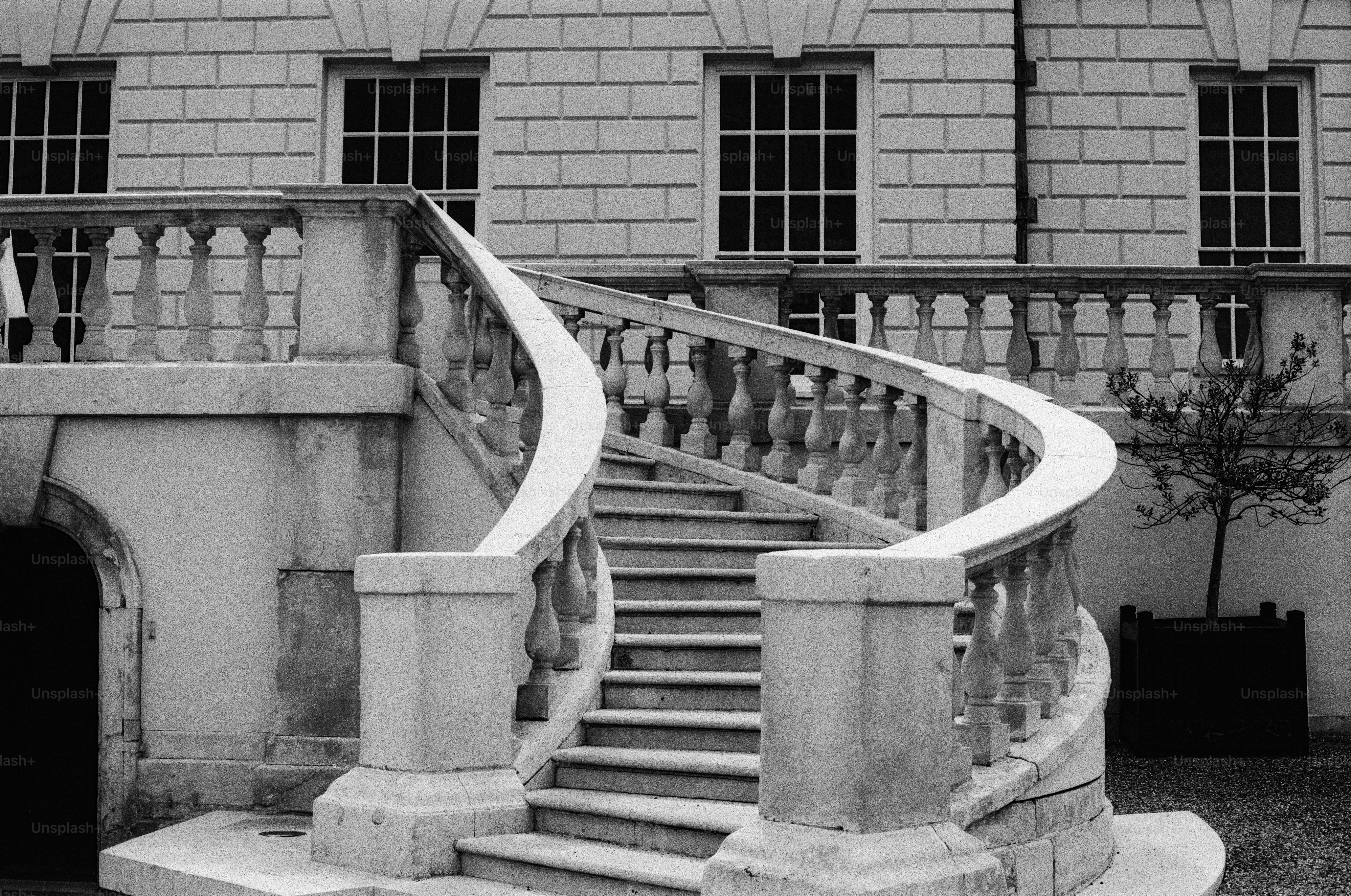 Curved stone staircase with balustrade