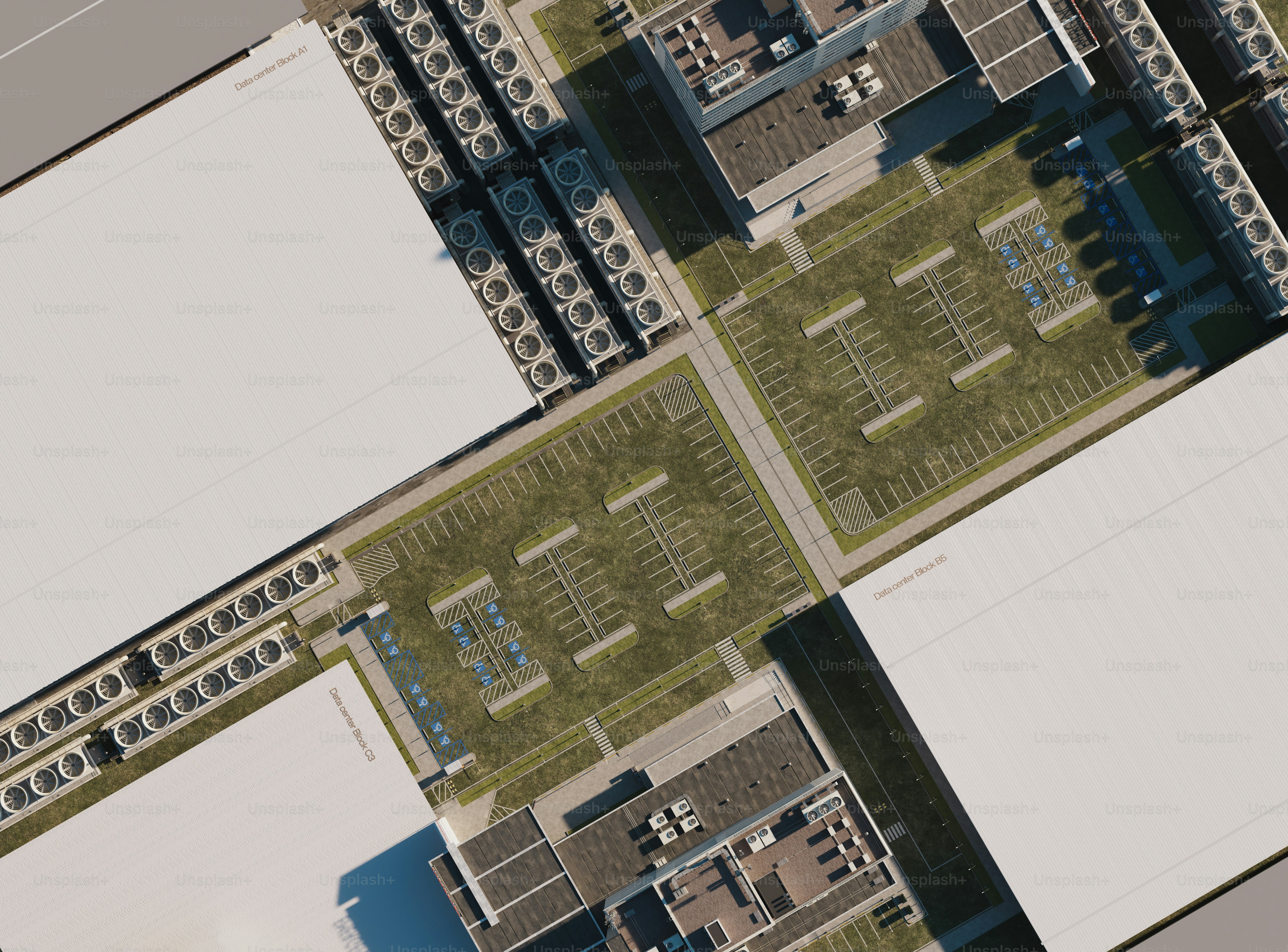 Industrial complex with flat roofs and multiple parking lots
