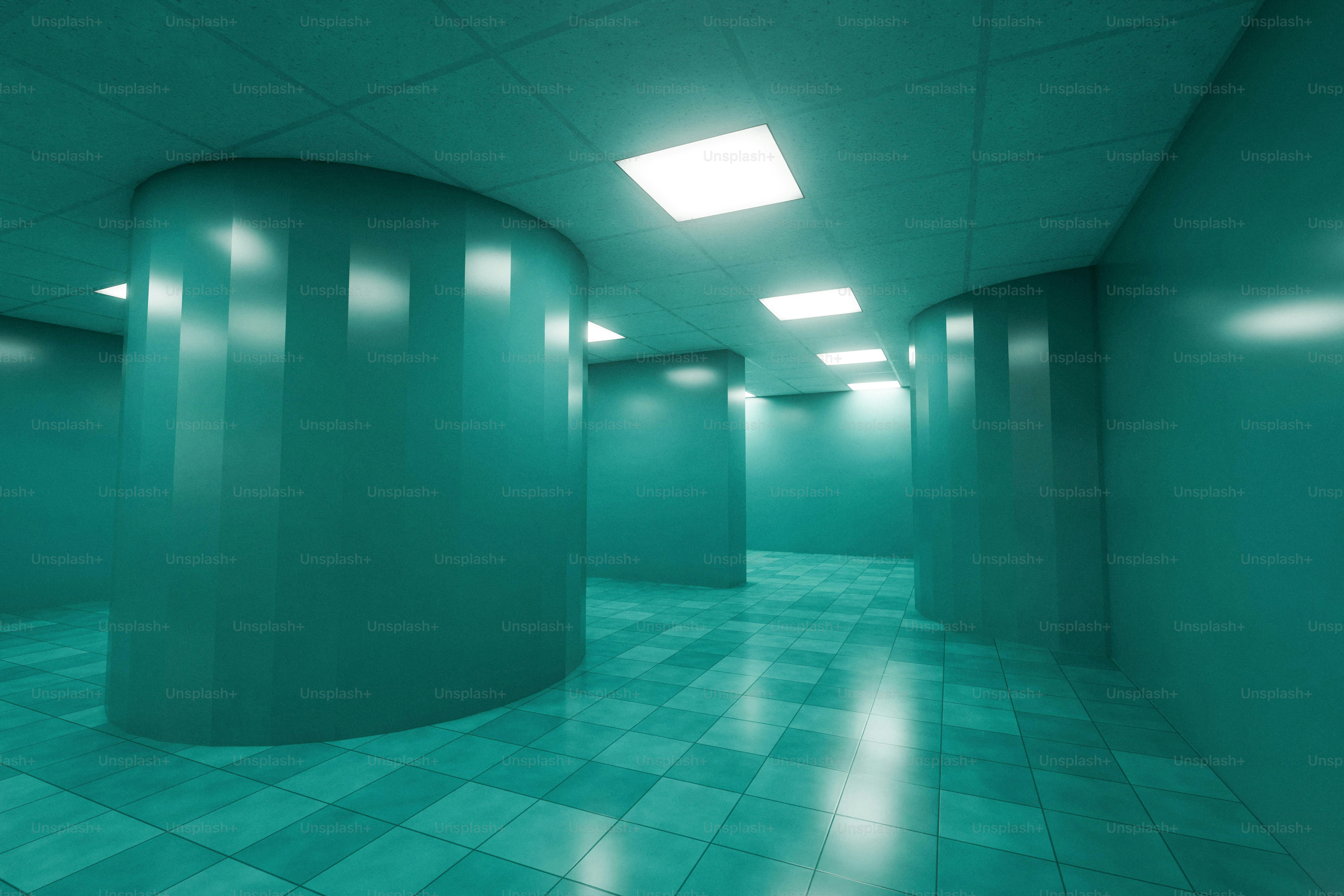 Teal corridor with round pillars and square ceiling lights