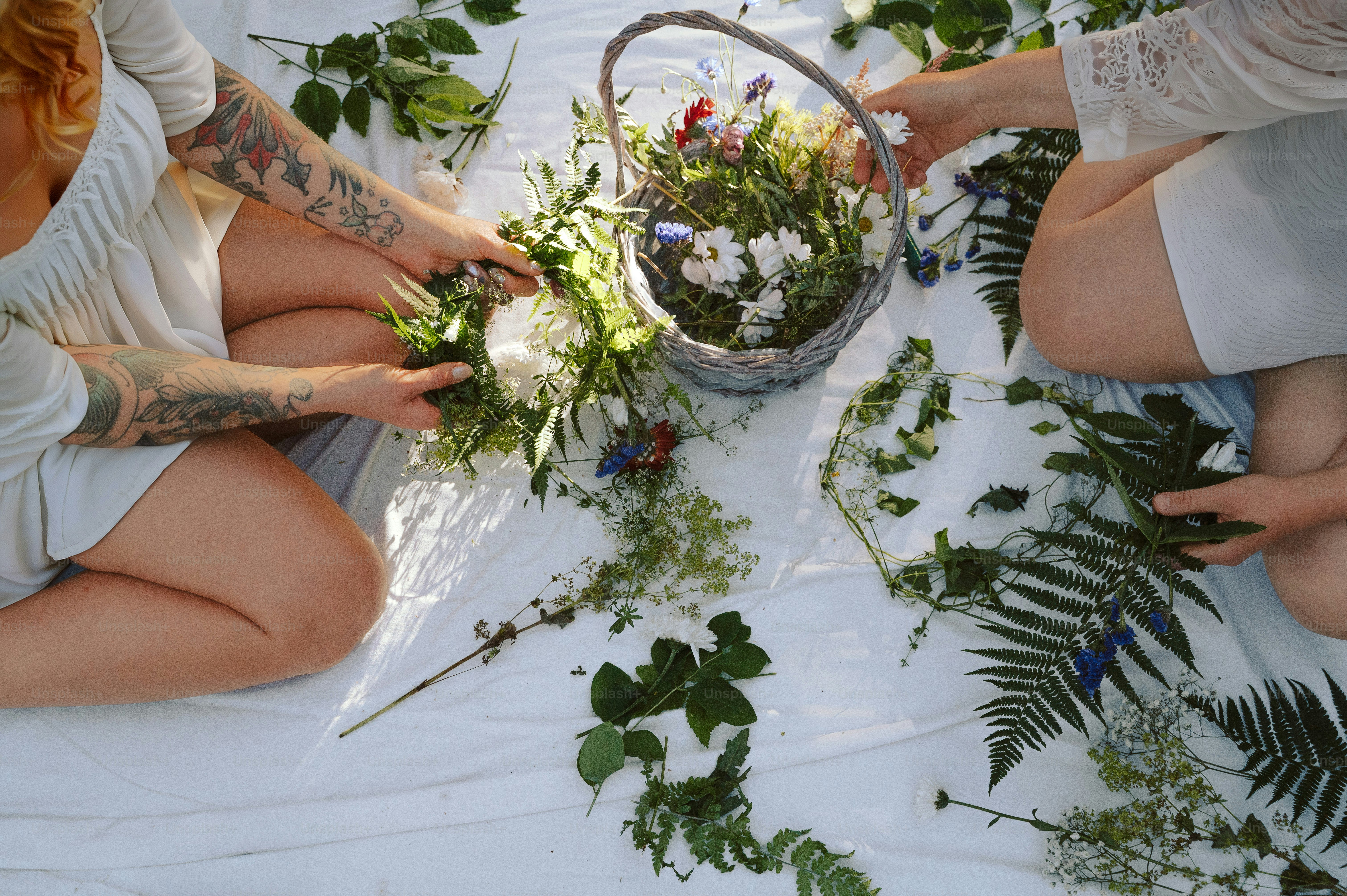 Making traditional midsummer flower crowns with wildflowers