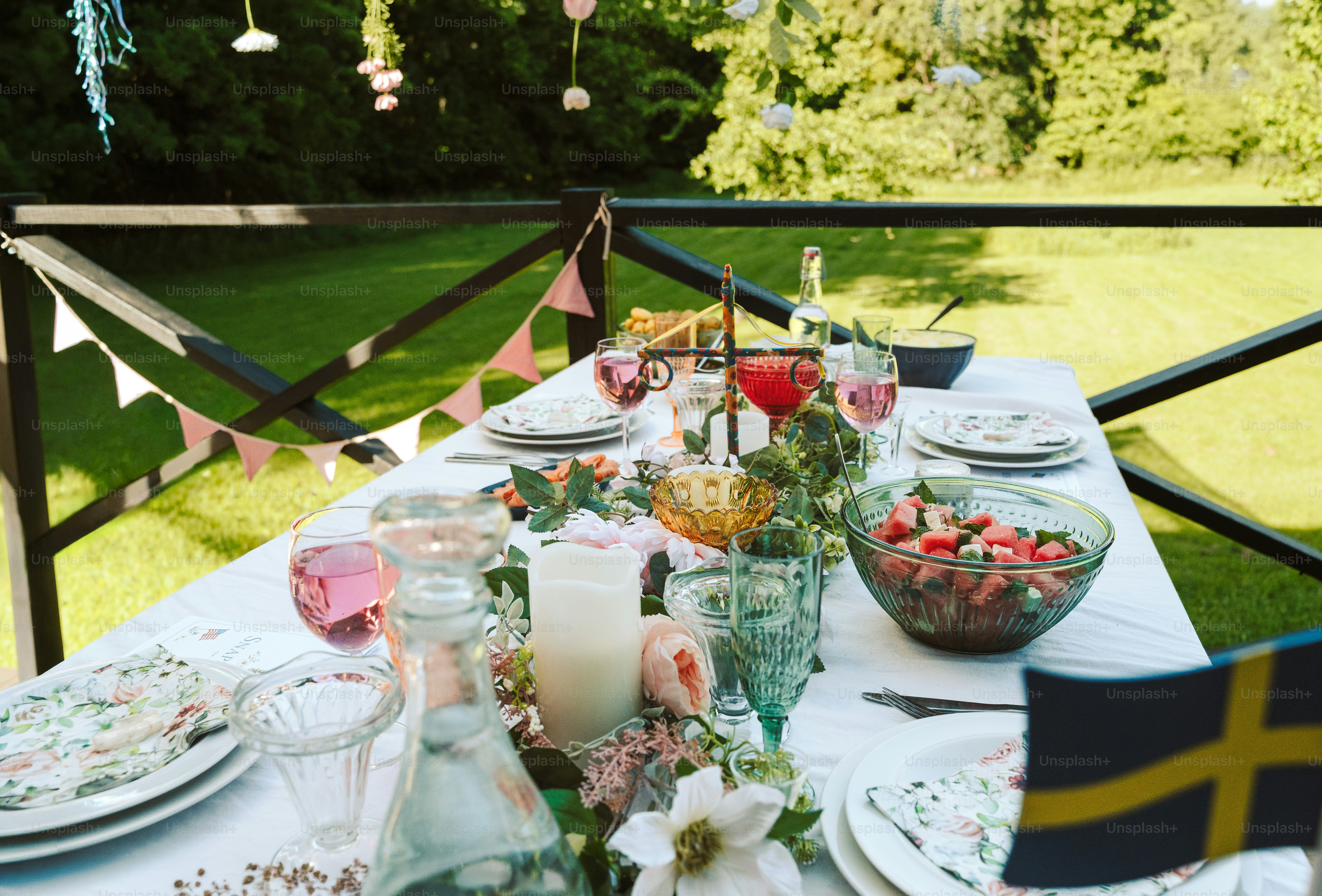 Swedish midsummer celebration table set outdoors
