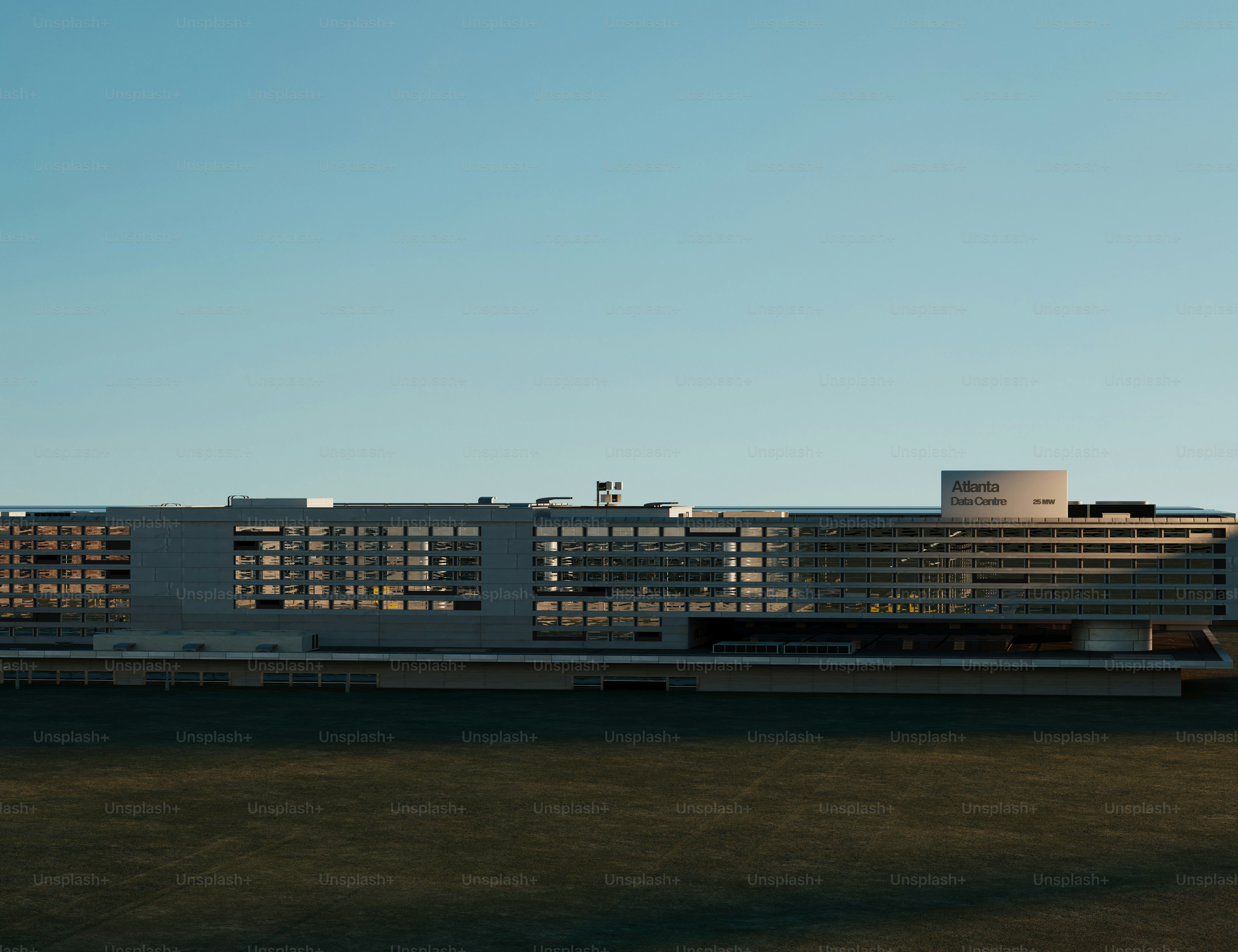 Large contemporary building under clear blue sky