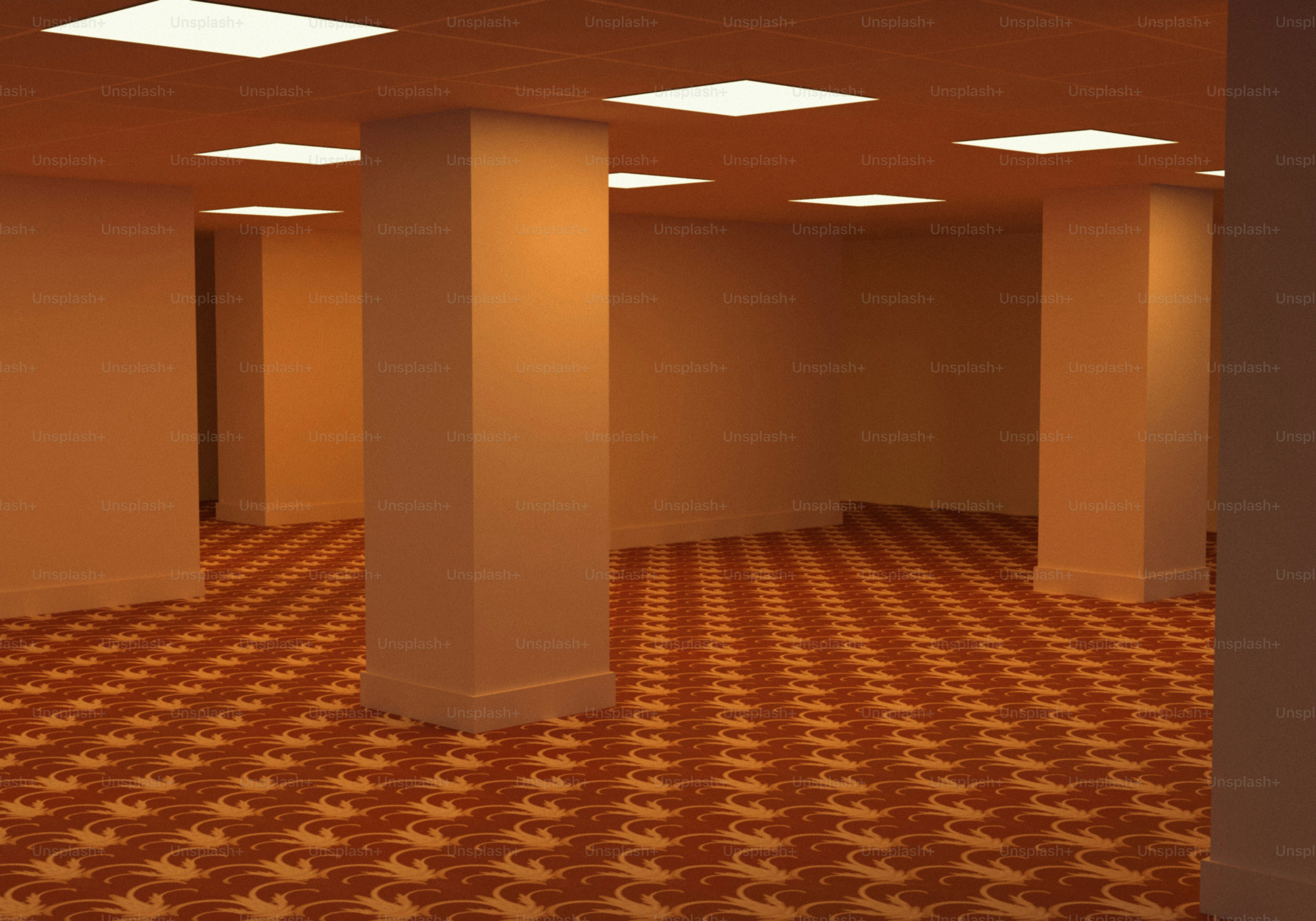 Orange room with patterned carpet, pillars, and square lights