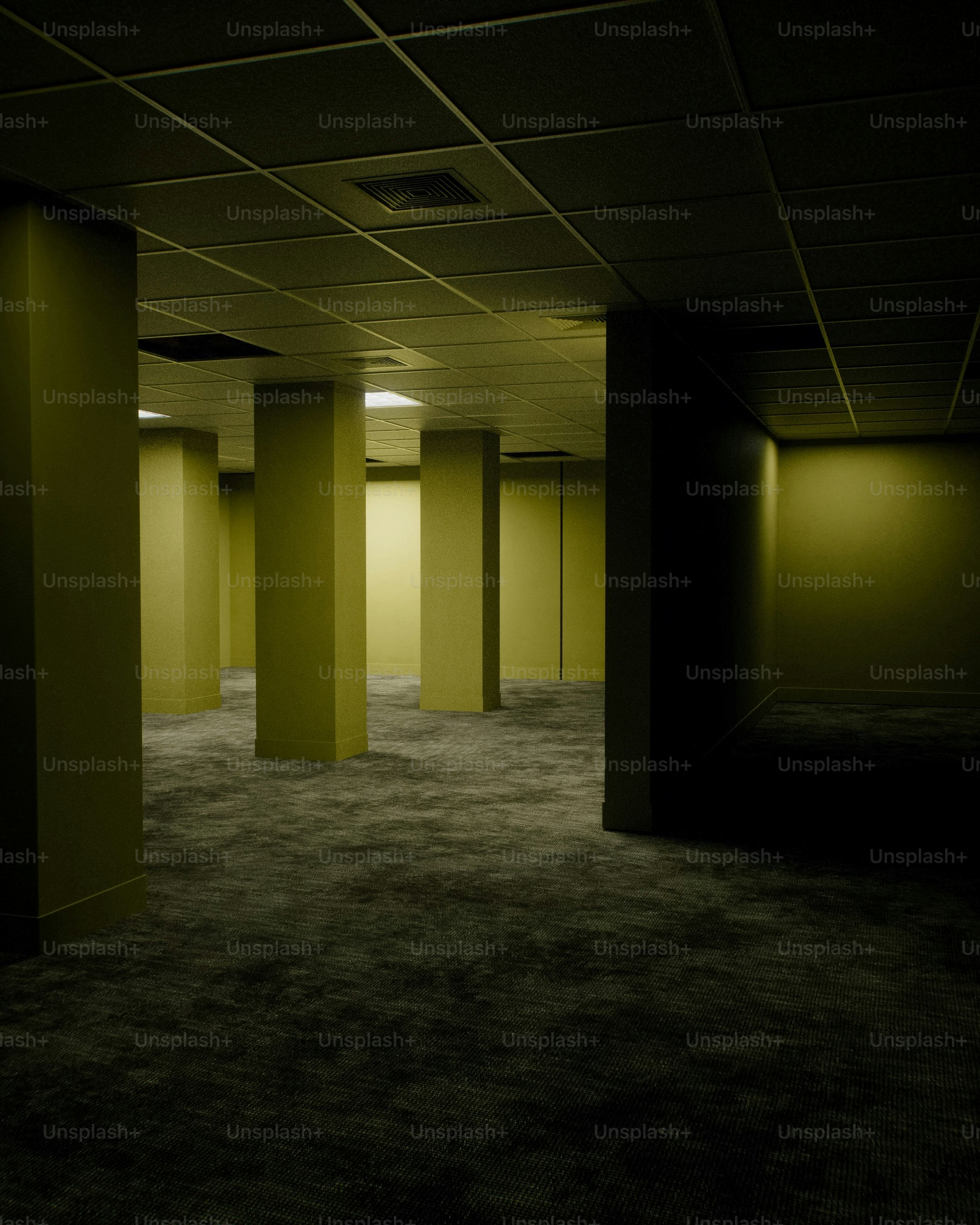 Yellow-walled liminal space with dark textured floor