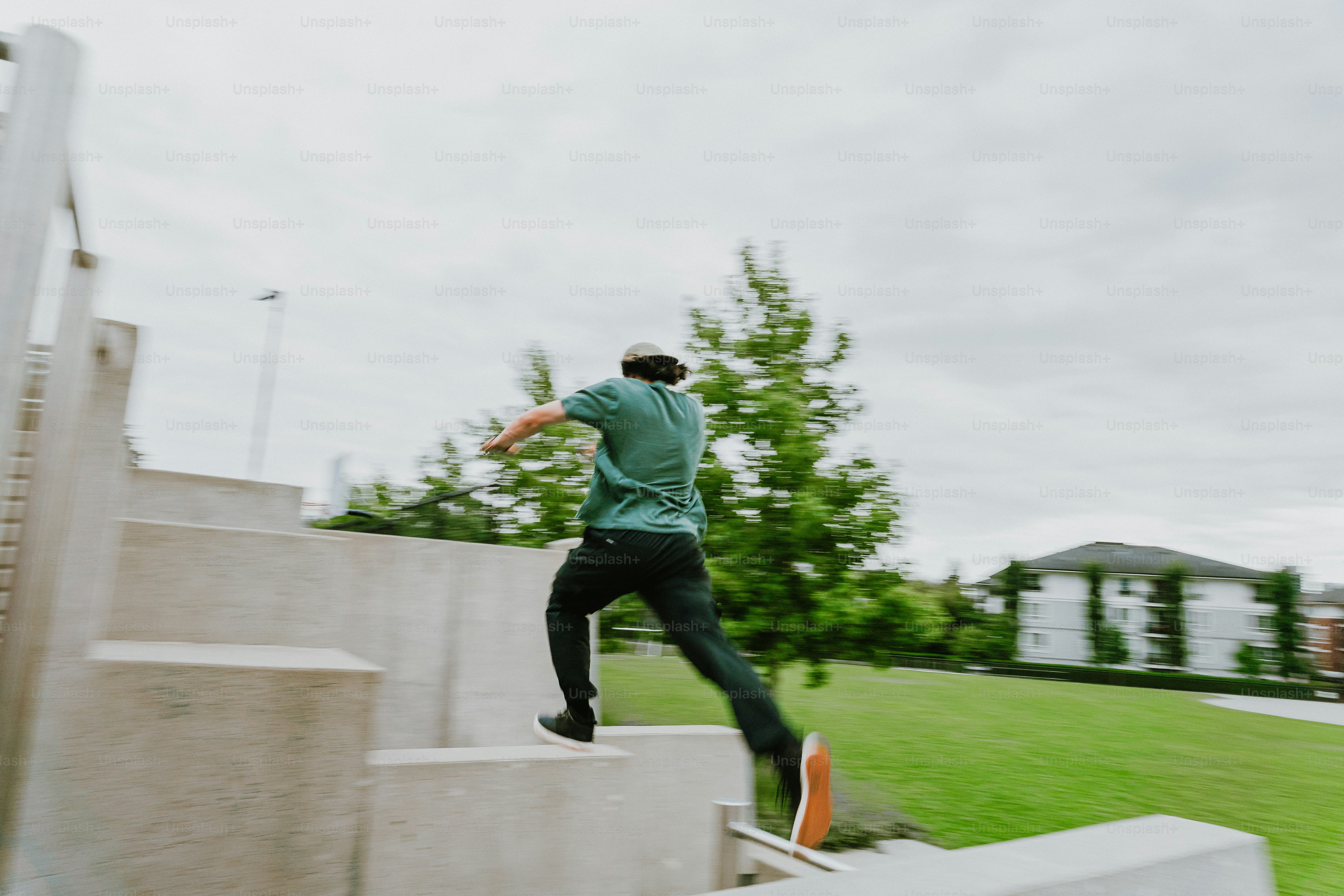 Person running up concrete steps with motion blur