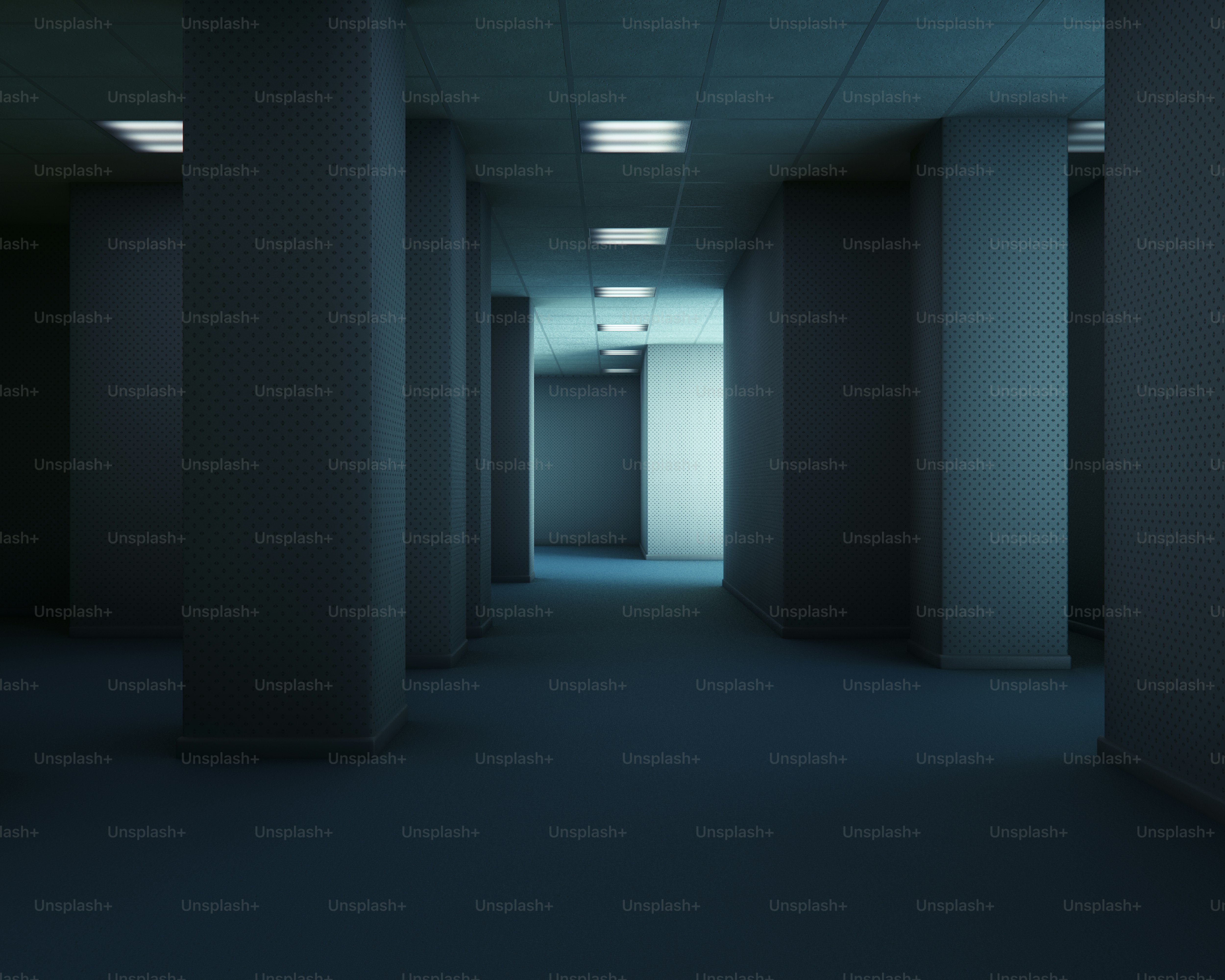 Empty liminal space with pillars and fluorescent lights