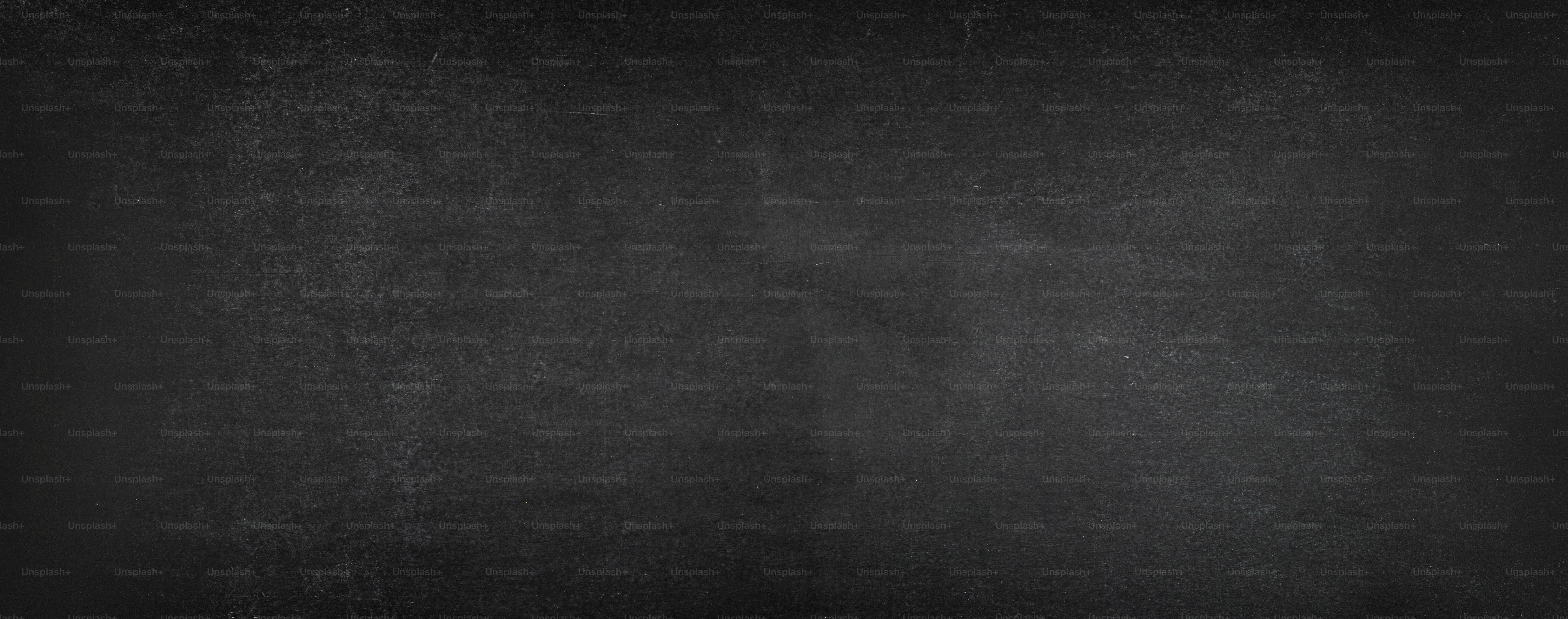 Chalk rubbed out on blackboard, blank chalkboard background
