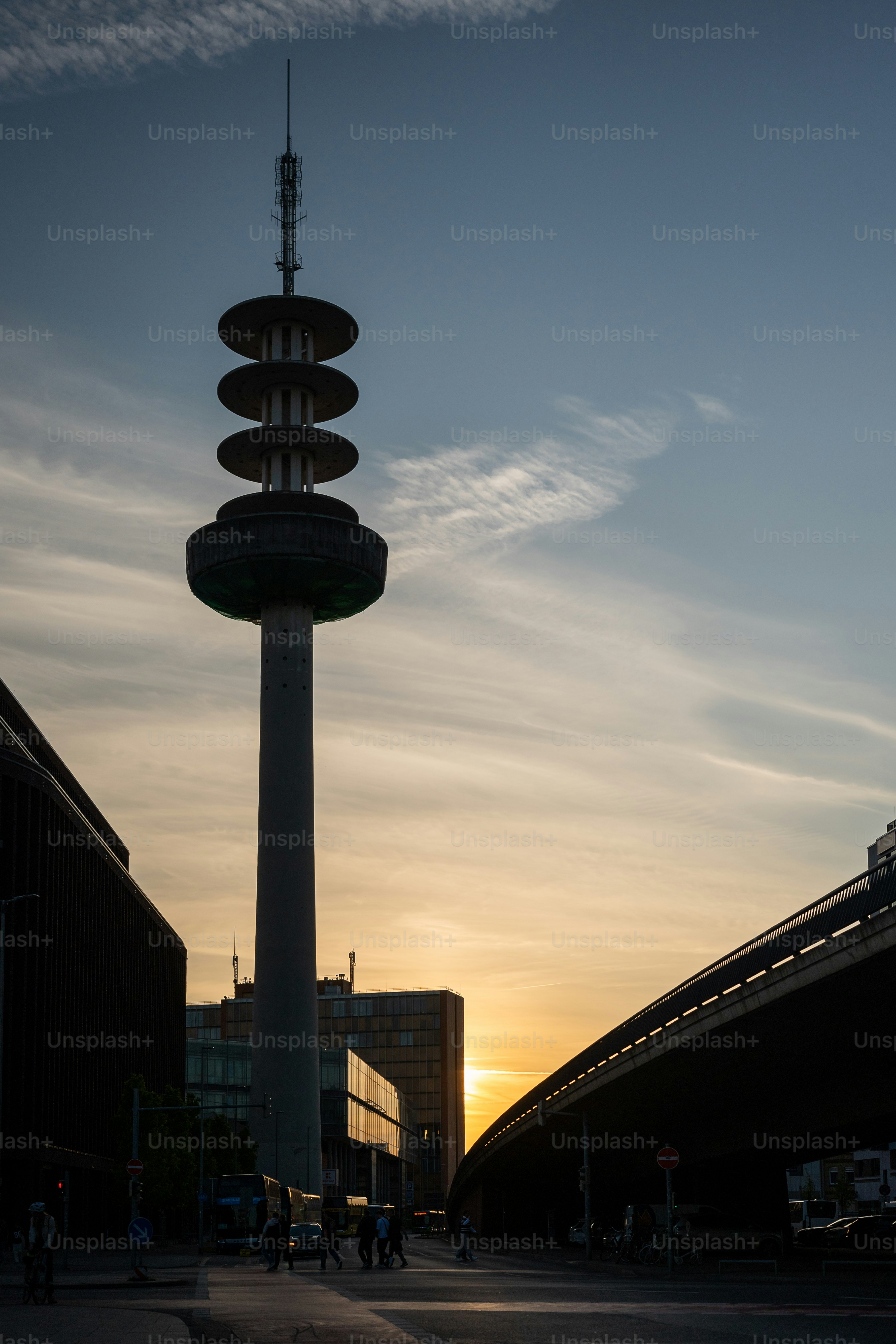 Telemax tower silhouette against golden sunset in hannover