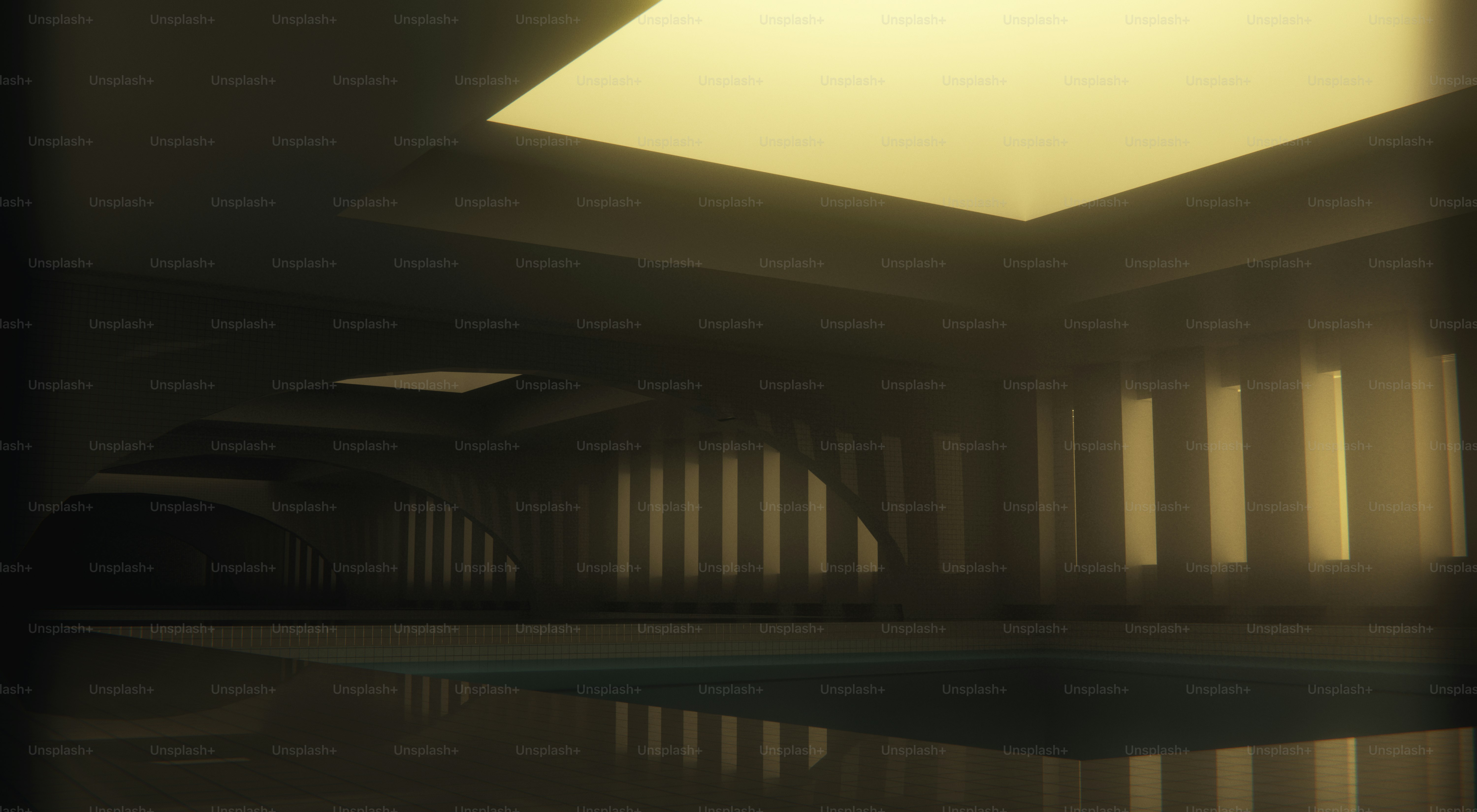 Indoor swimming pool illuminated by warm skylight