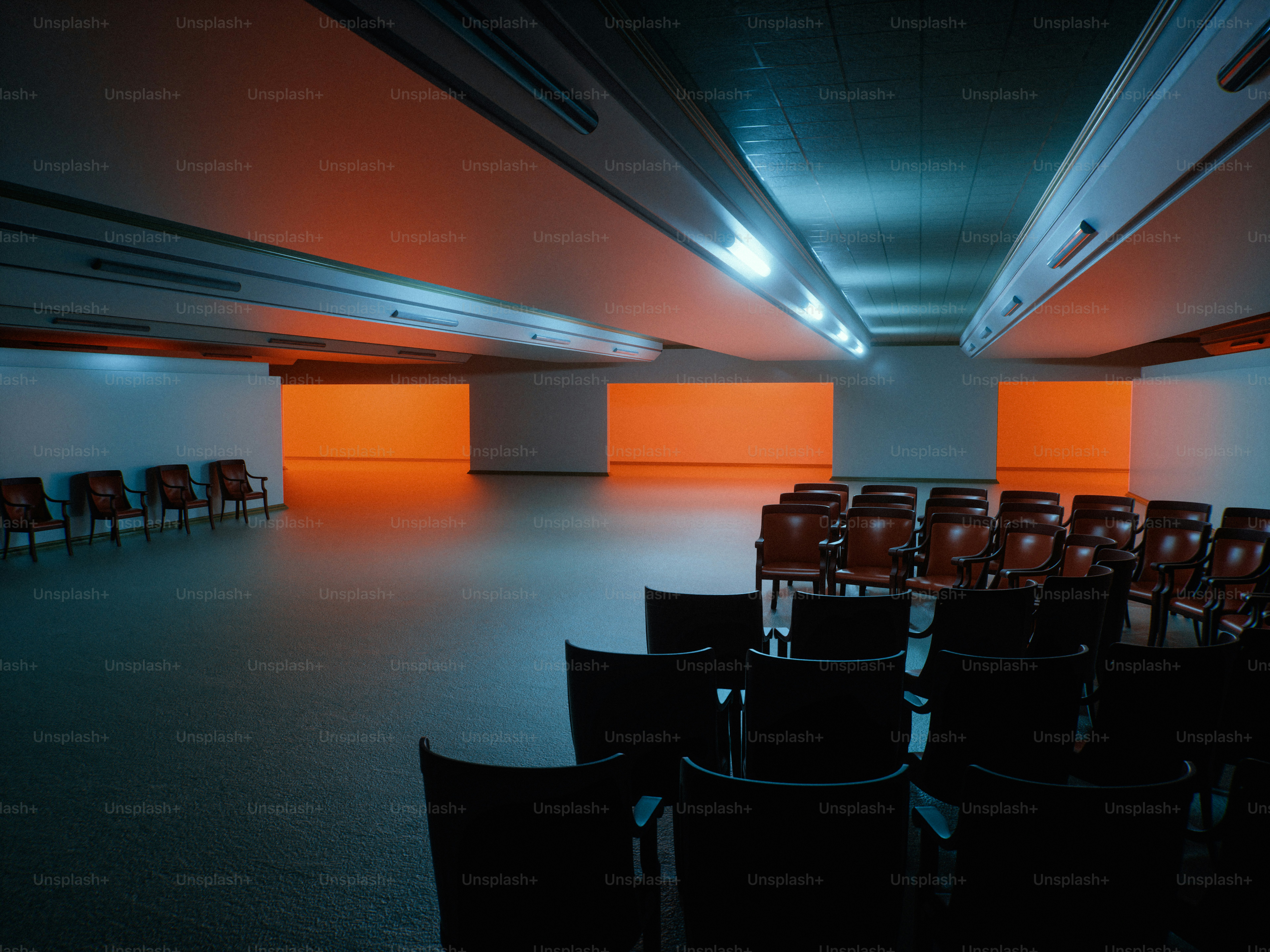 Empty room with chairs and orange glowing panels