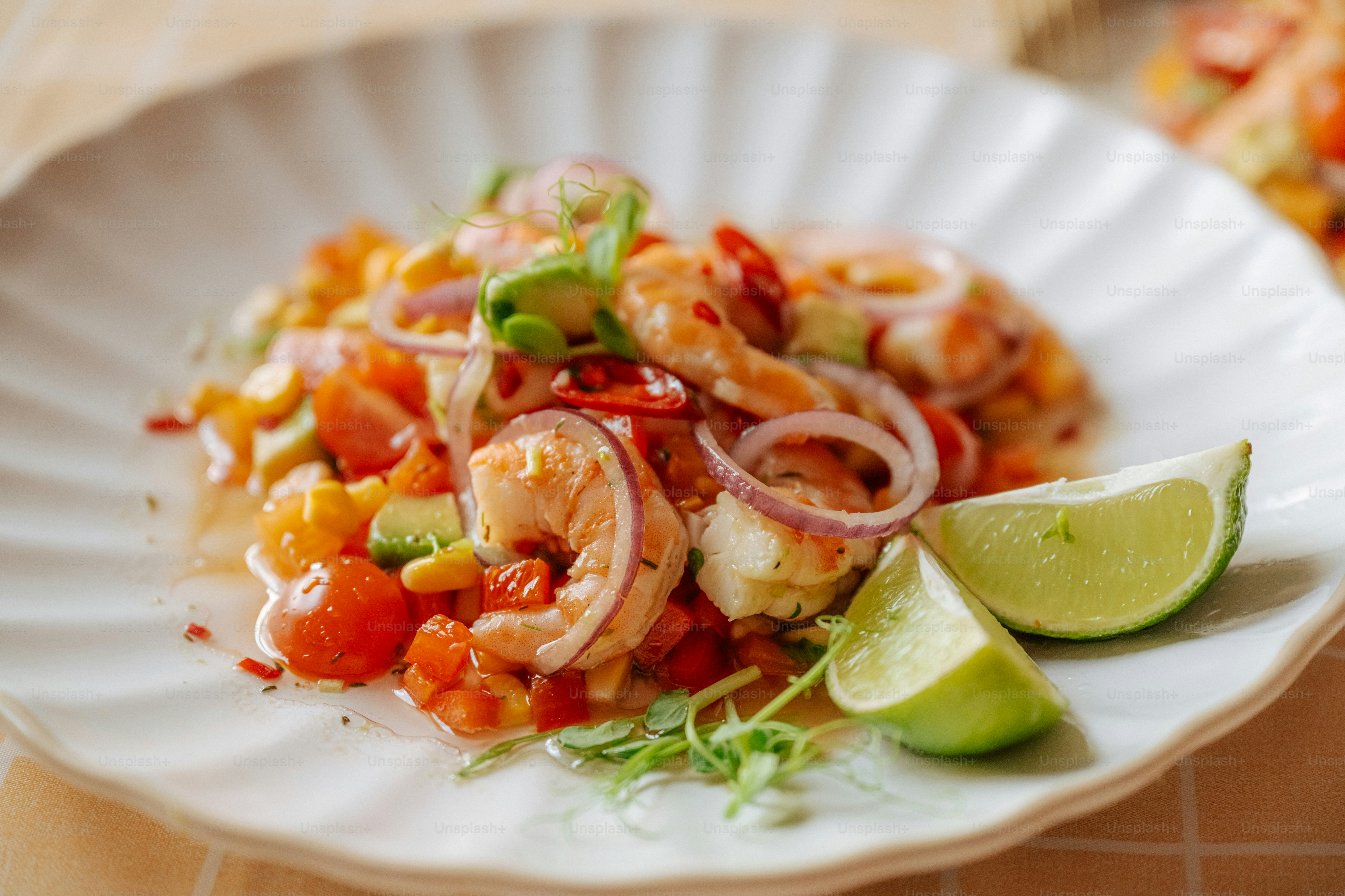 Fresh shrimp ceviche with mango, avocado, and lime - Photo on Unsplash+