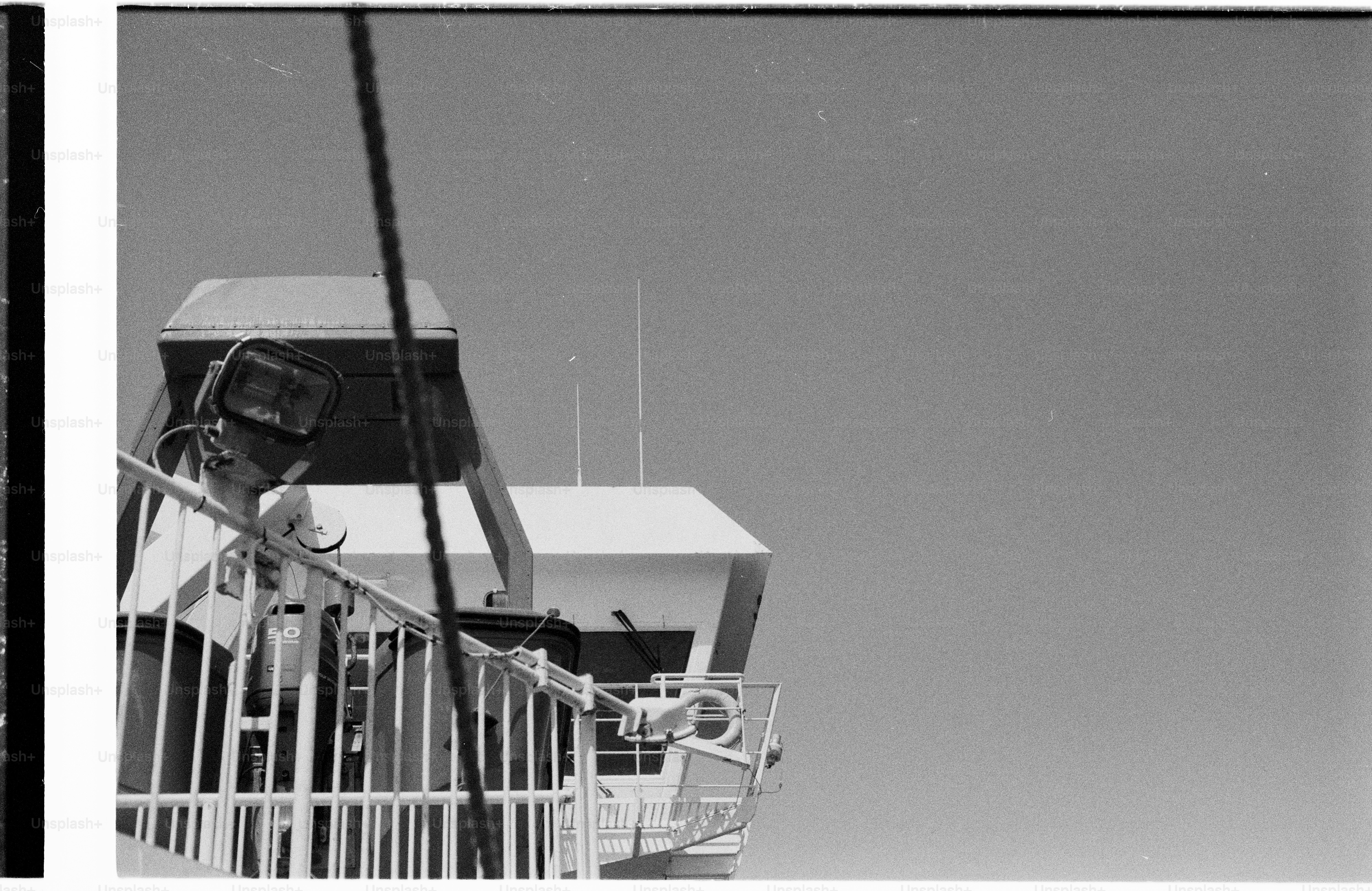 Ship's deck and bridge under a clear sky