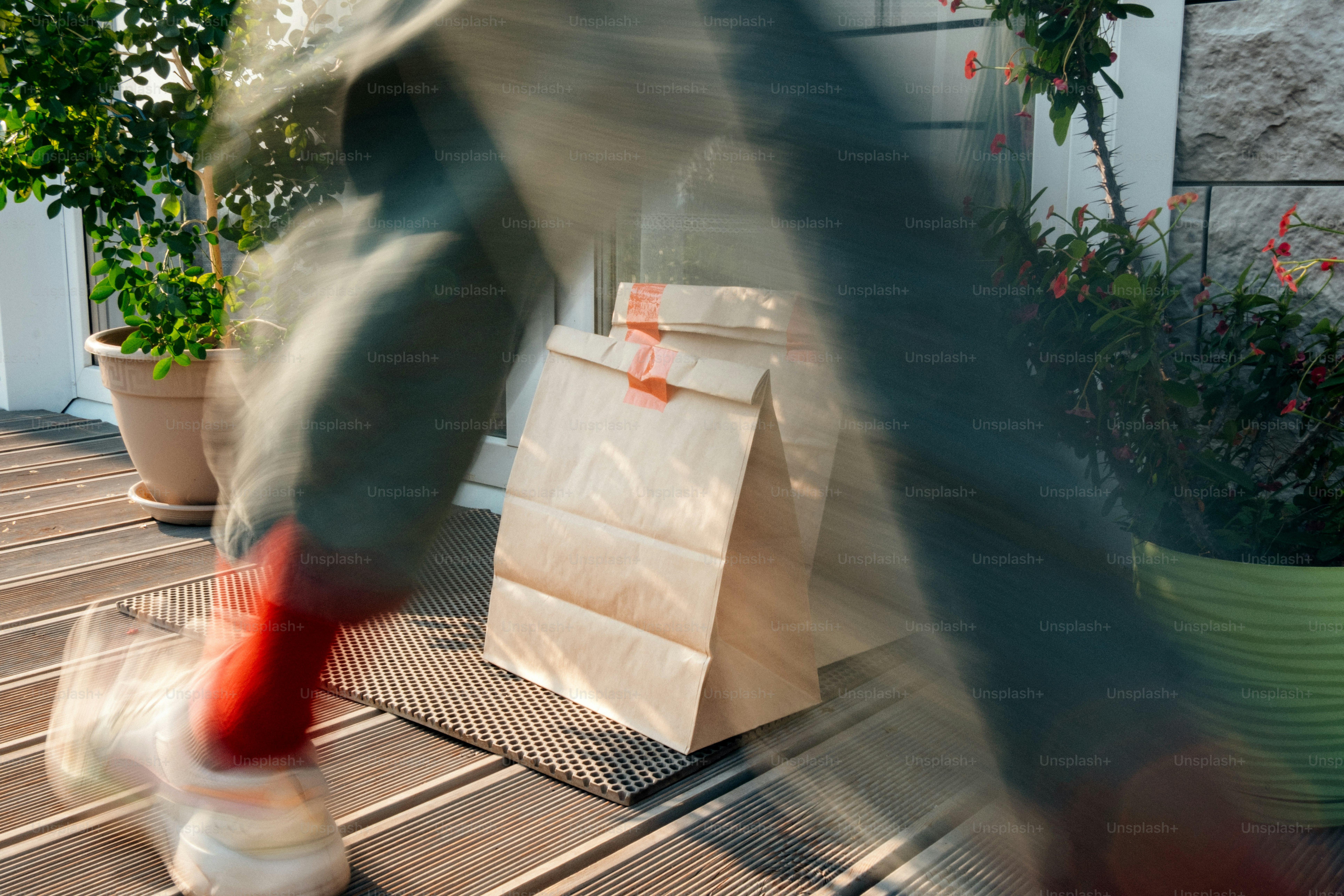 Motion blurred delivery of two paper bags