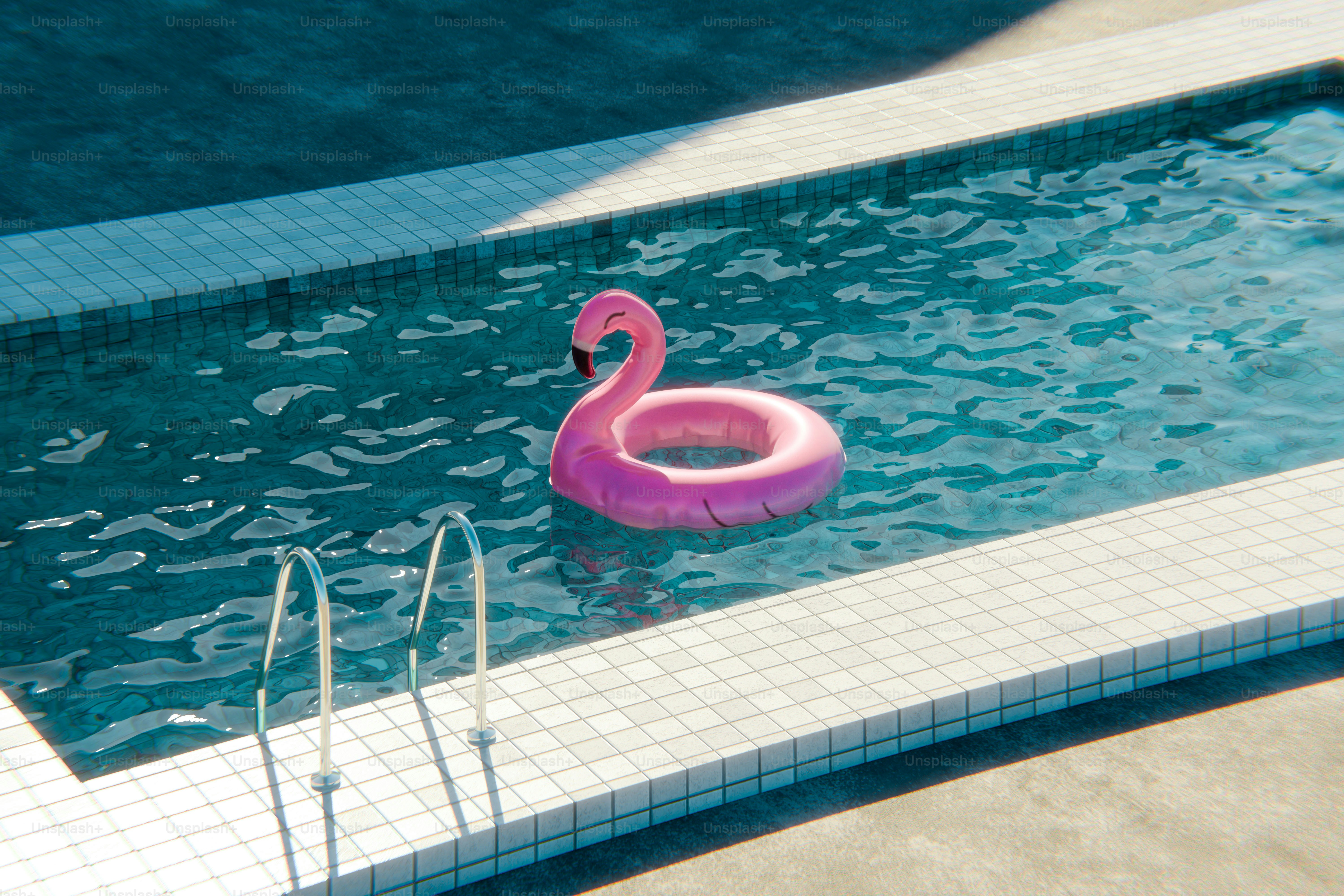 Pink flamingo inflatable floating in a swimming pool
