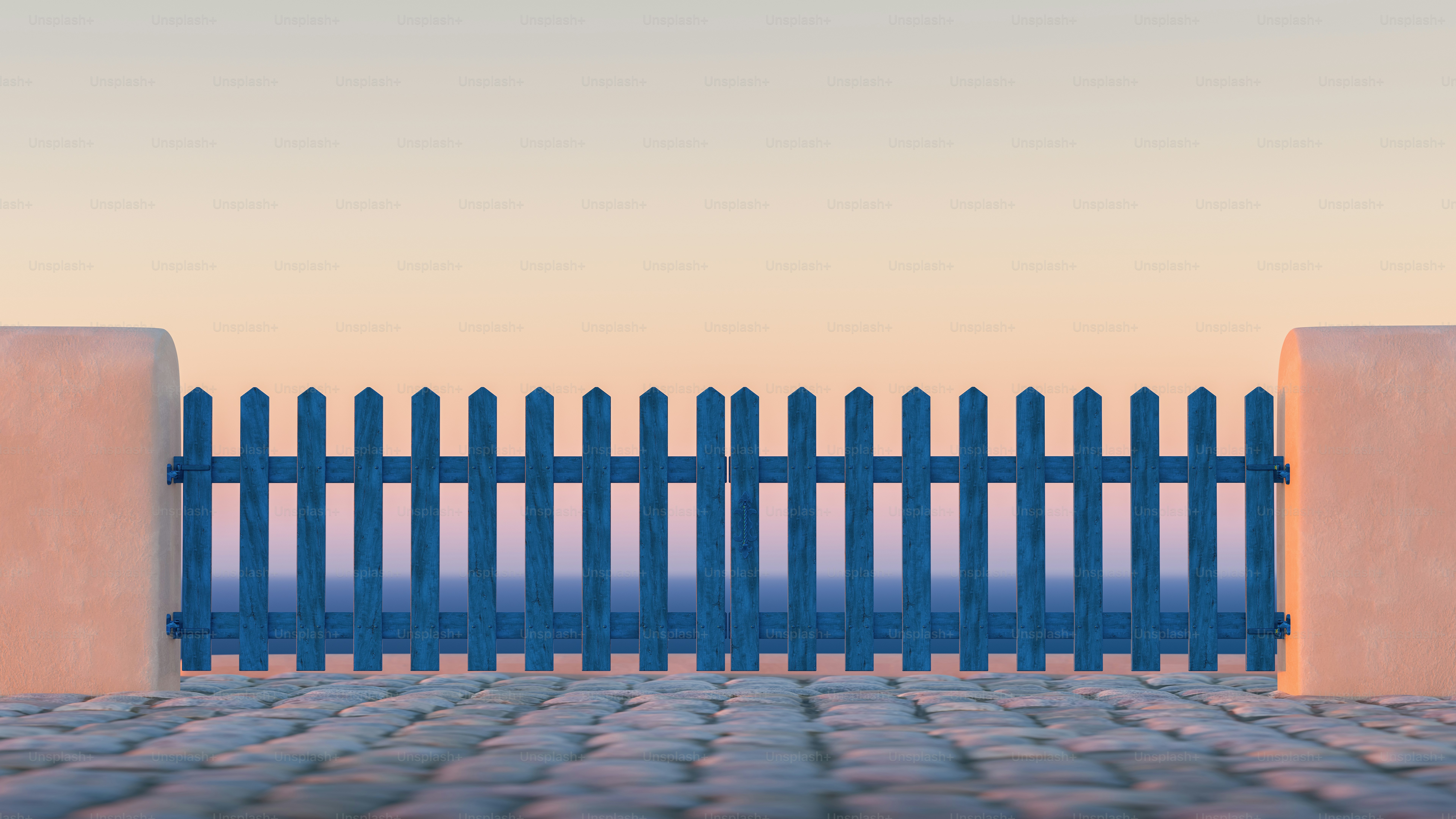 Blue picket fence gate between stone pillars on cobblestone