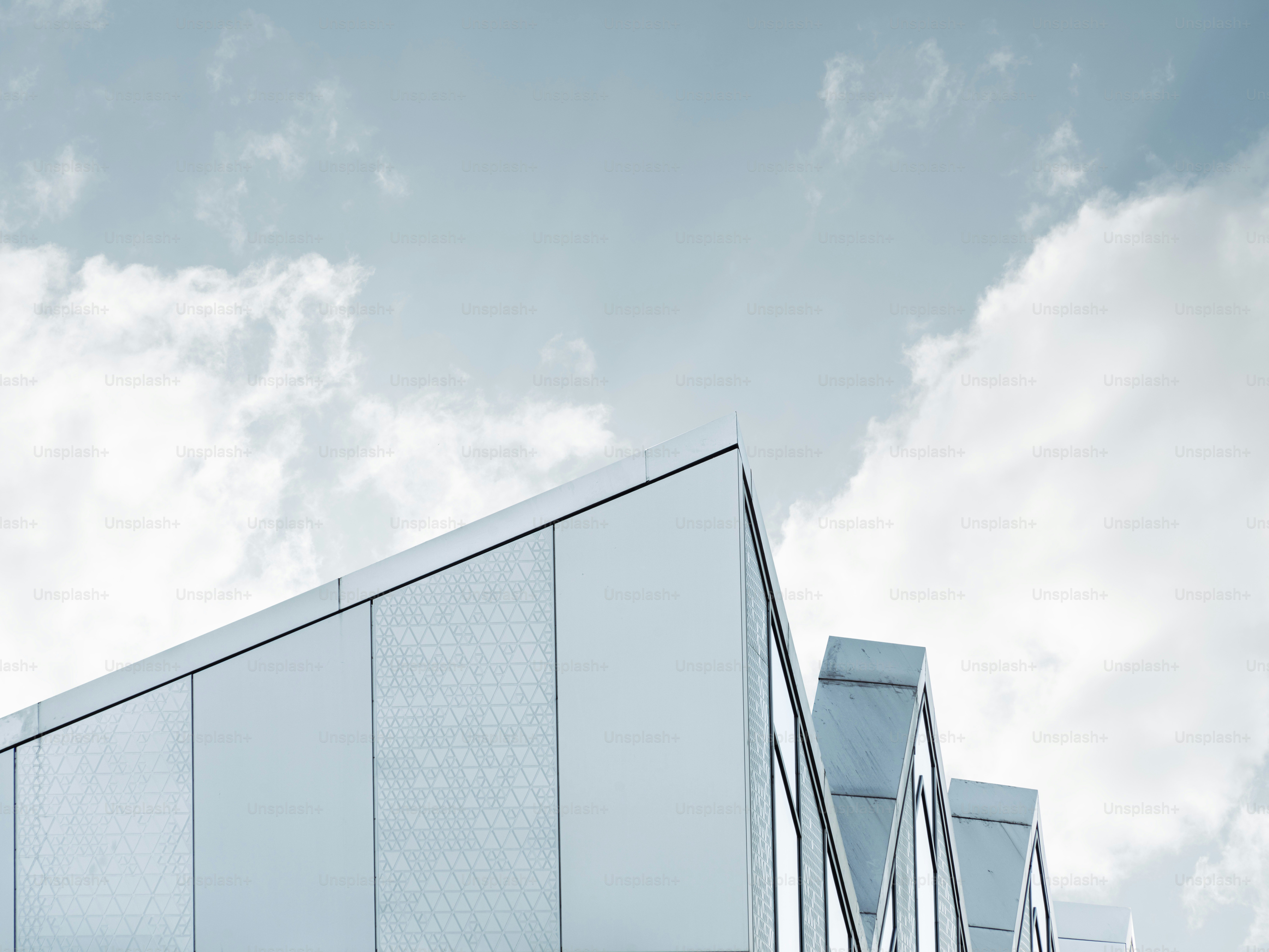 Modern london architecture against a cloudy sky