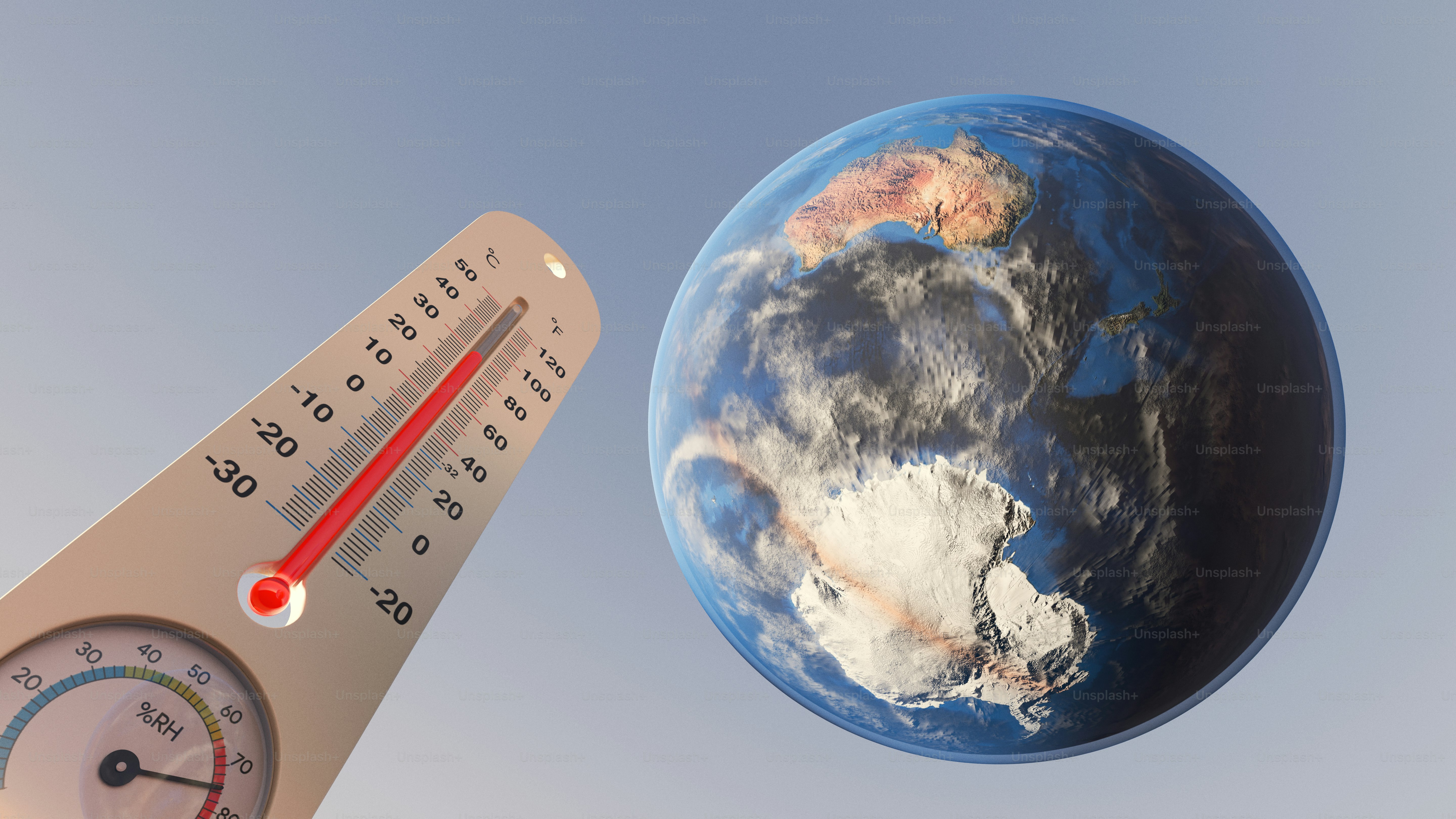 Earth globe with thermometer showing rising global temperatures