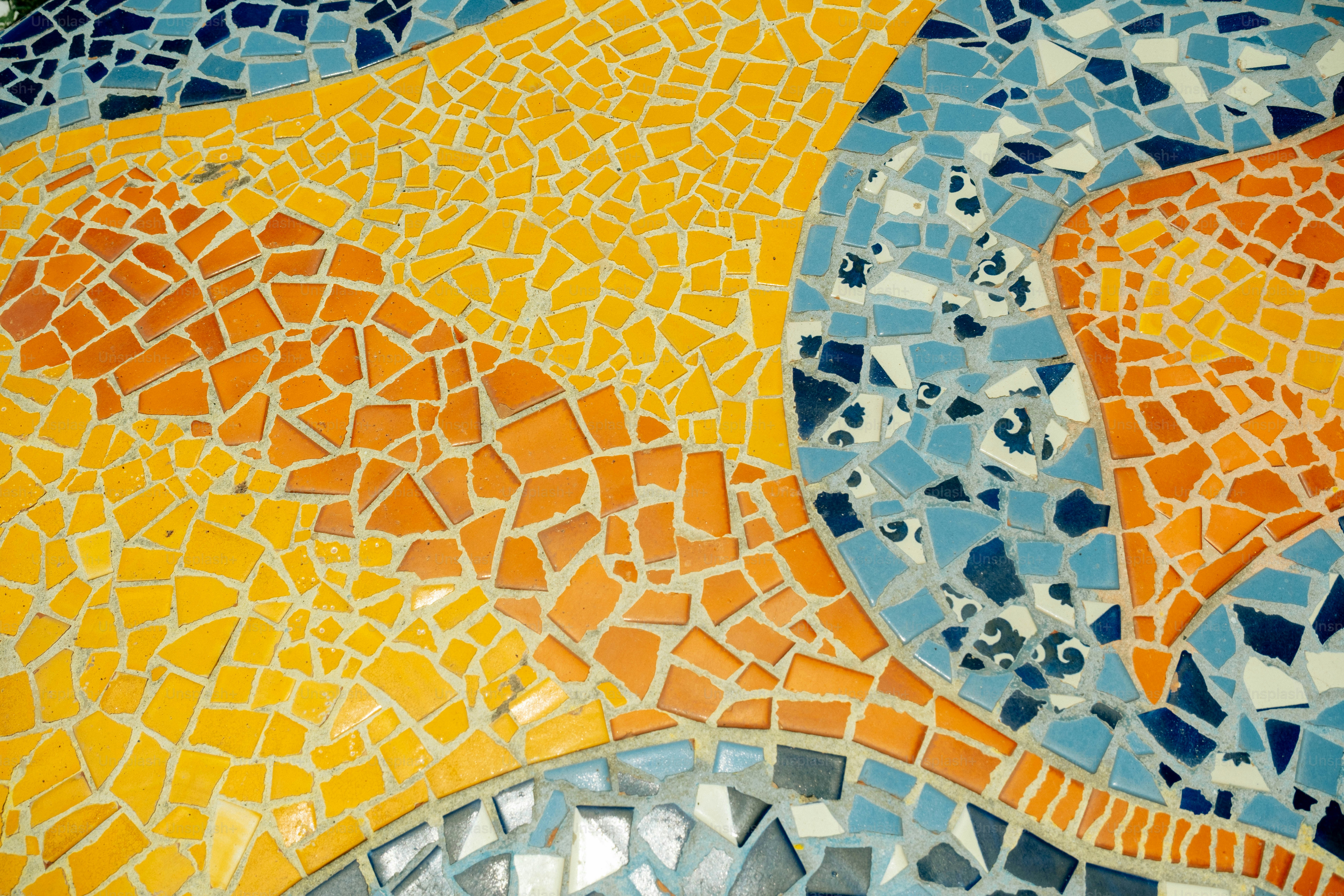 Wavy mosaic pattern with orange and blue tiles
