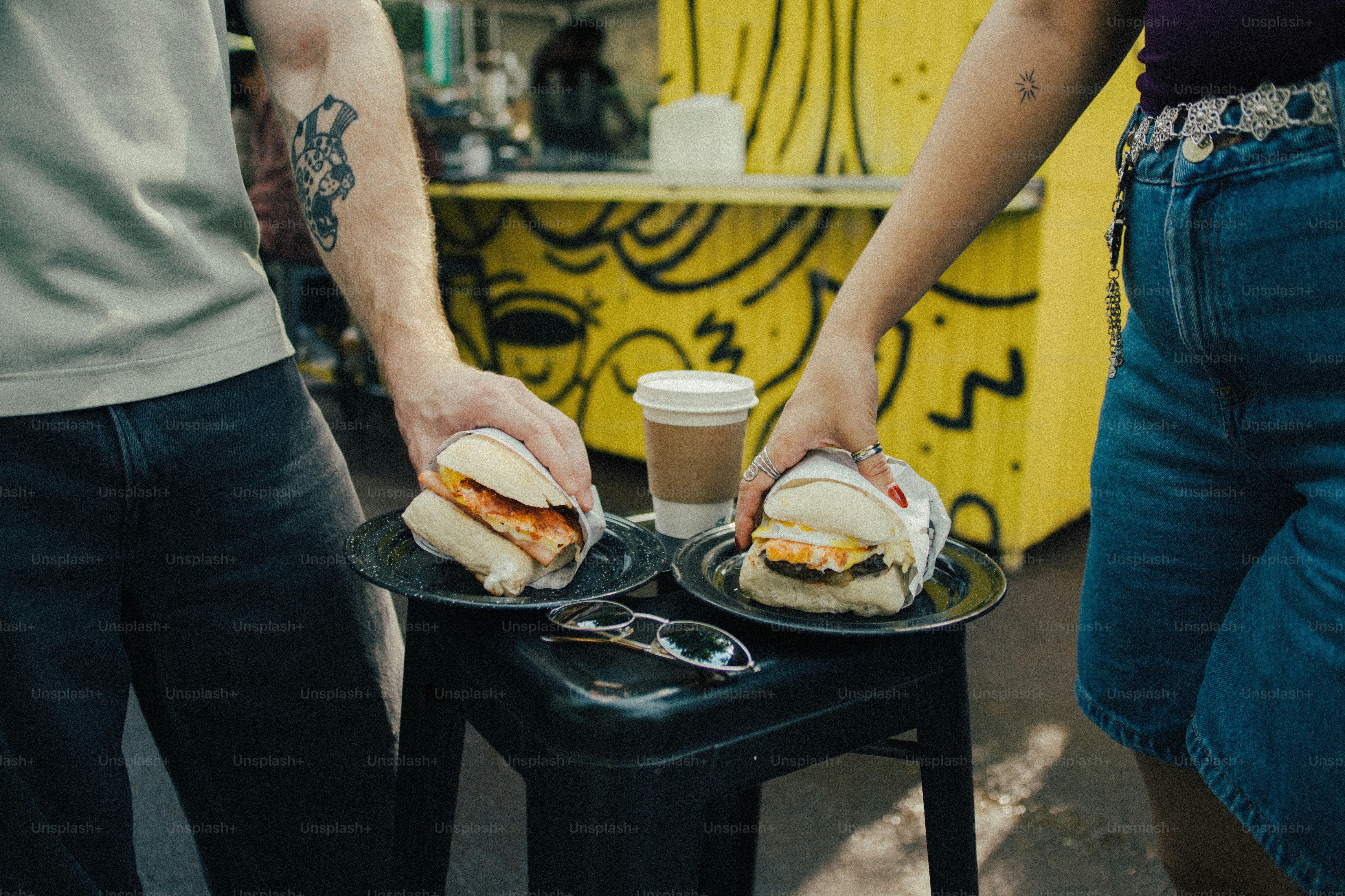Sandwiches and coffee from a vibrant food stall